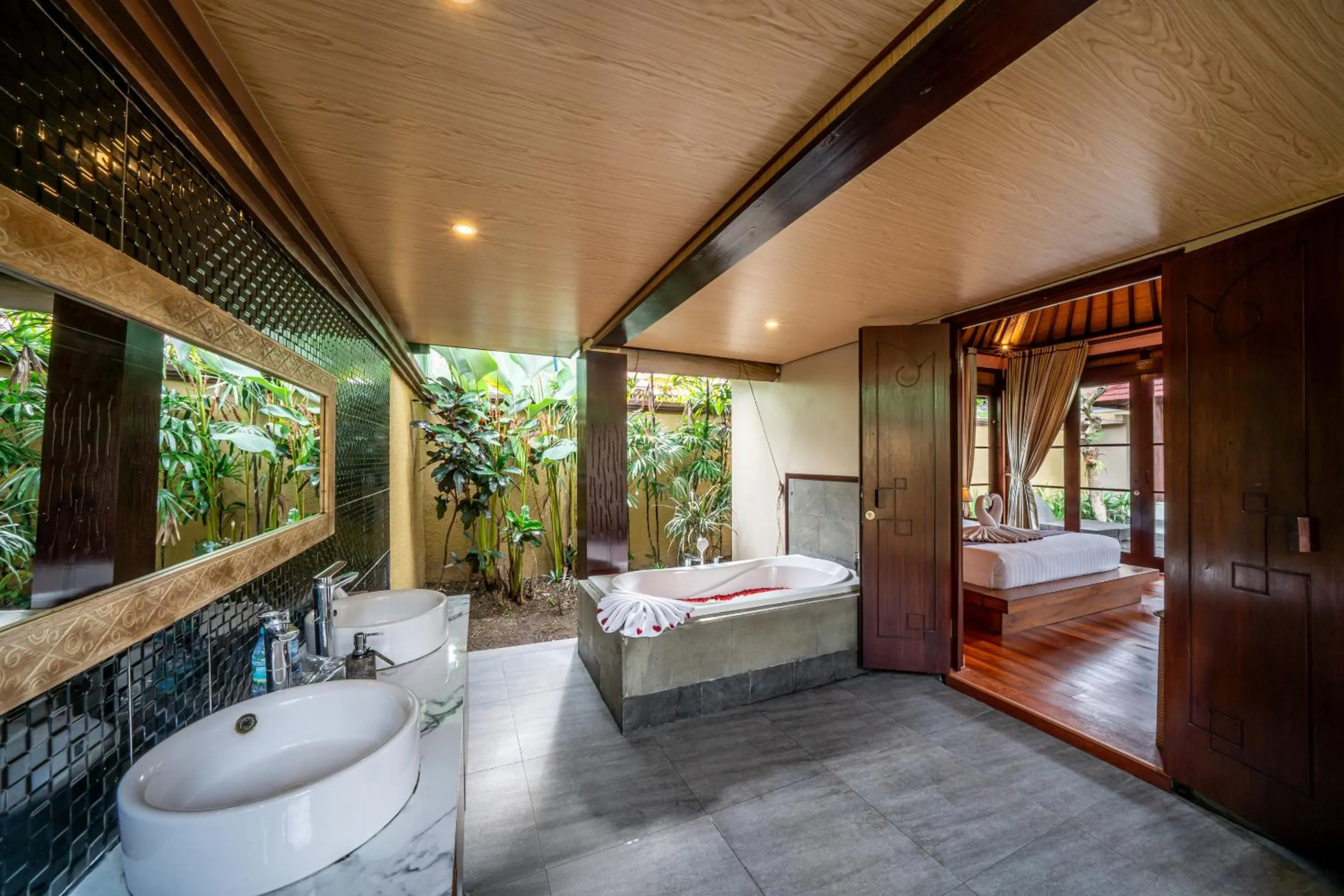 Bed in The Kampung Ubud Villa