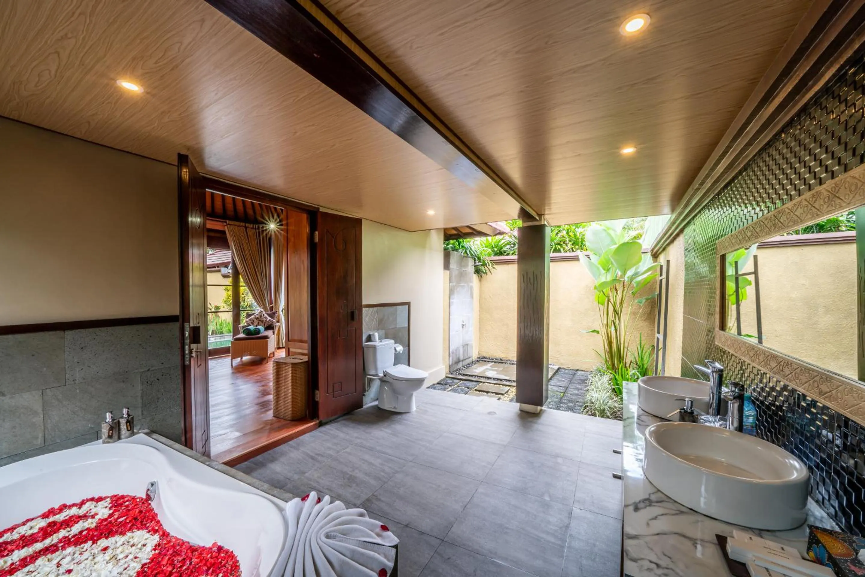 Bed in The Kampung Ubud Villa