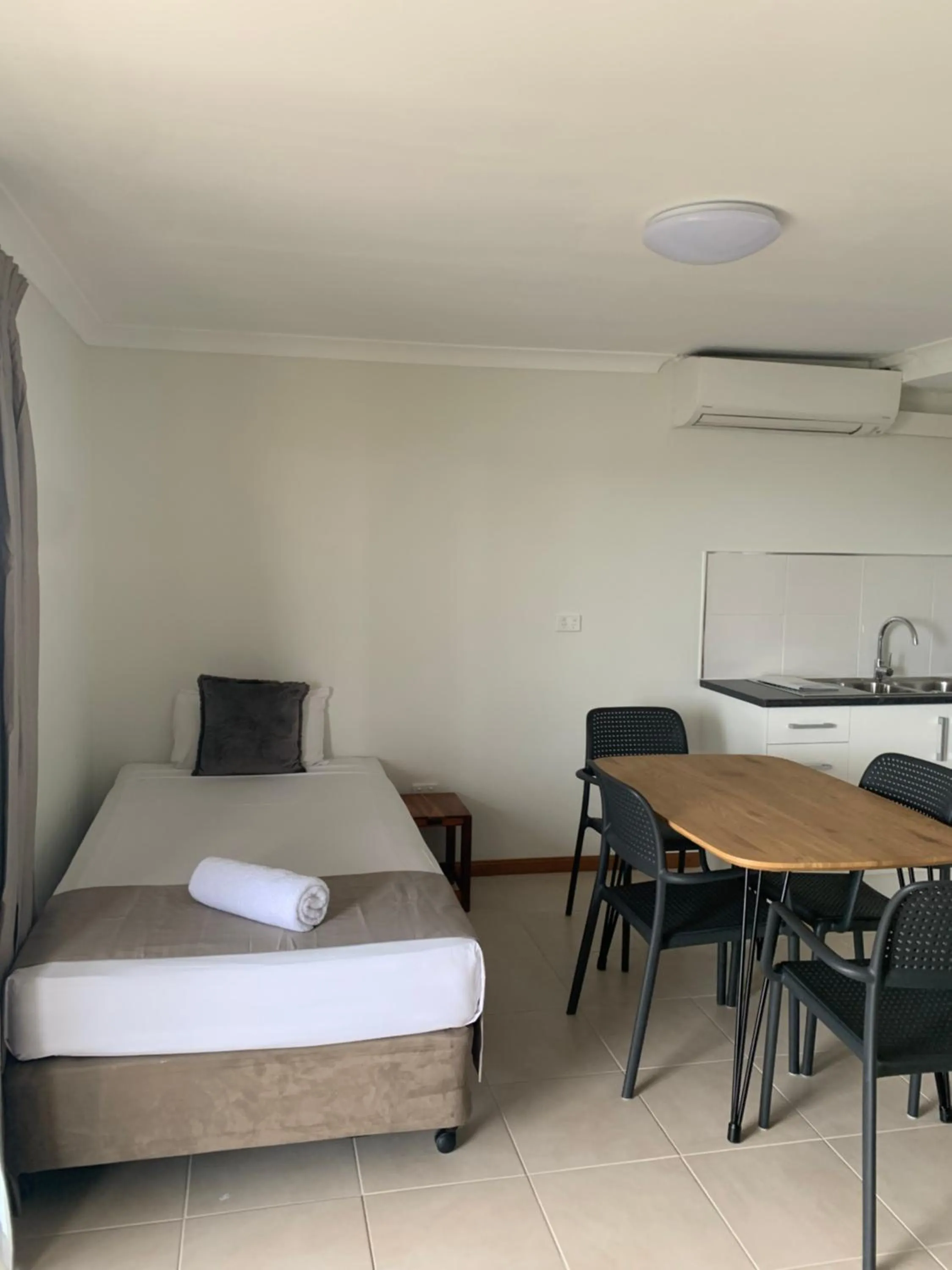 Bed in Airlie Beach Apartments