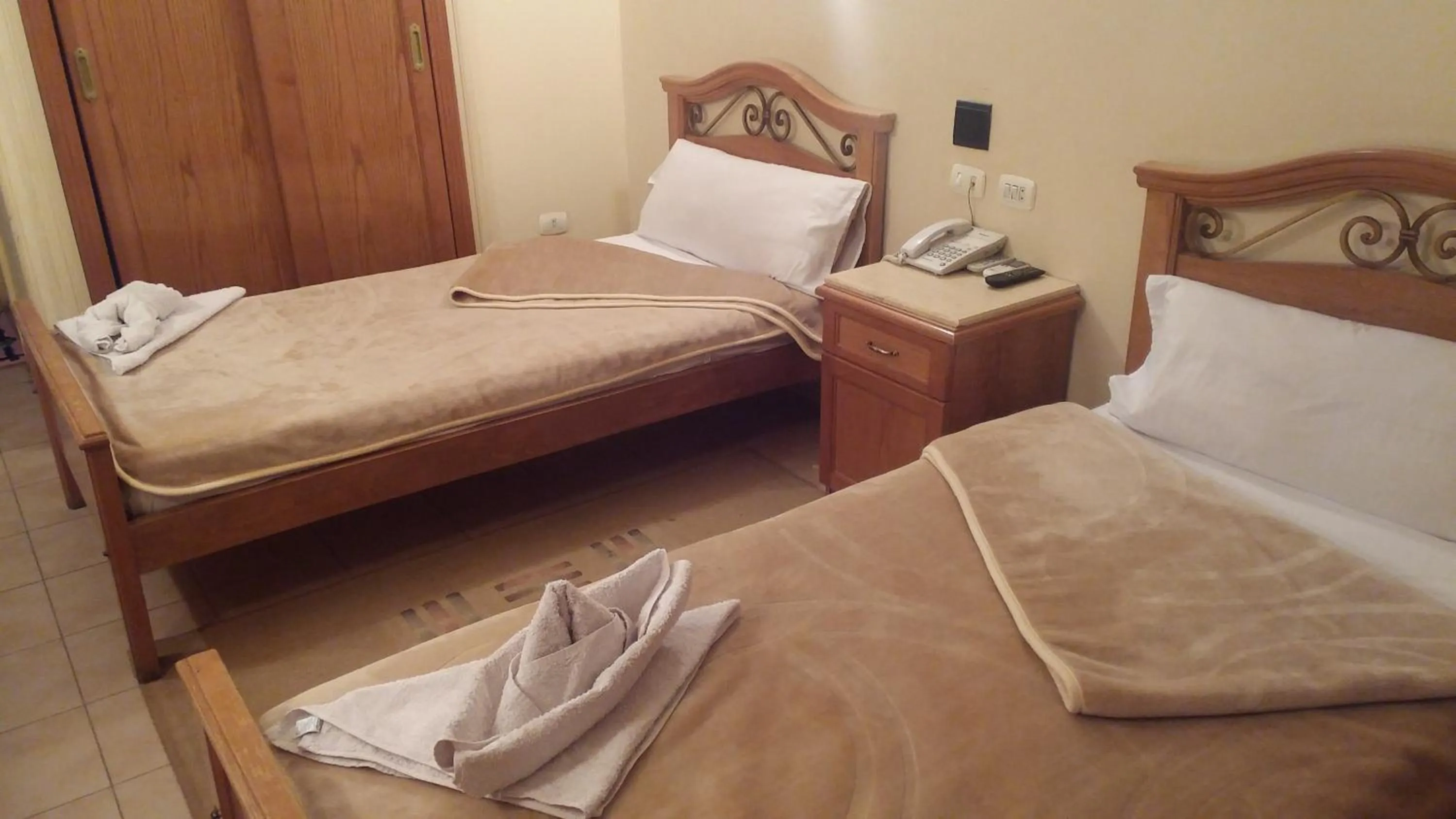 Bed in Applicators Hotel