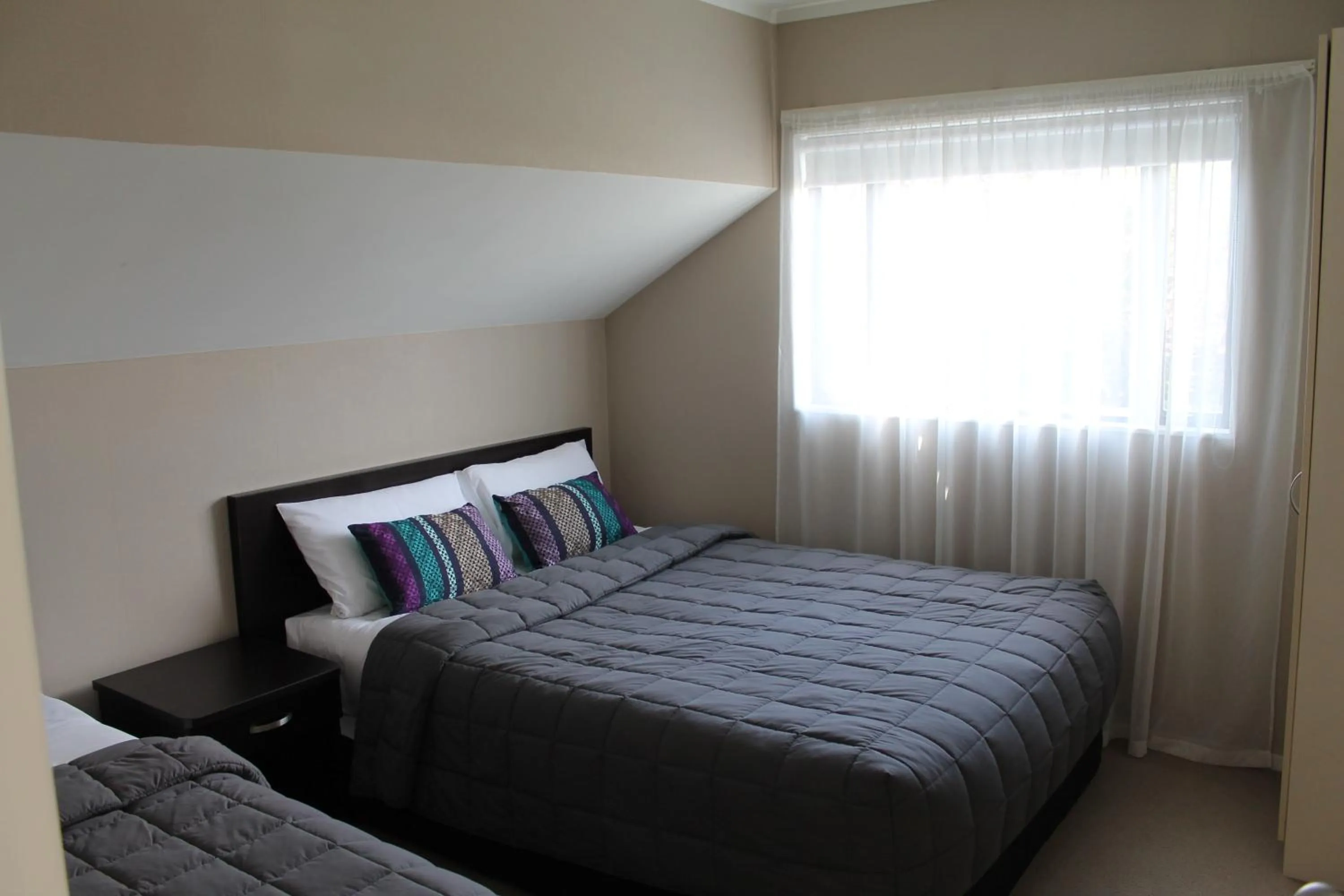 Bedroom, Bed in Aquarius Motor Inn