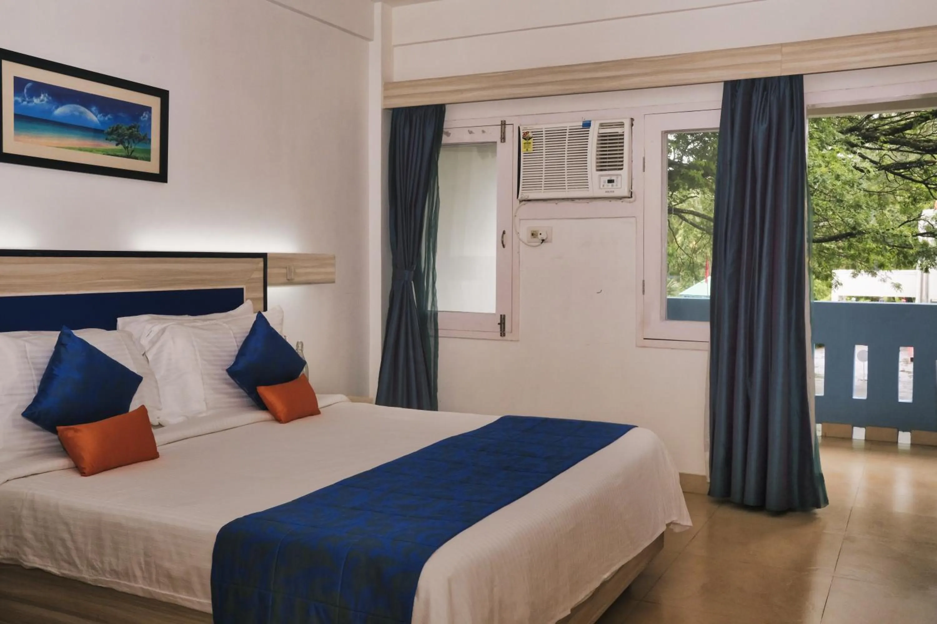 Bedroom in Peerless Resort Sri Vijaya Puram