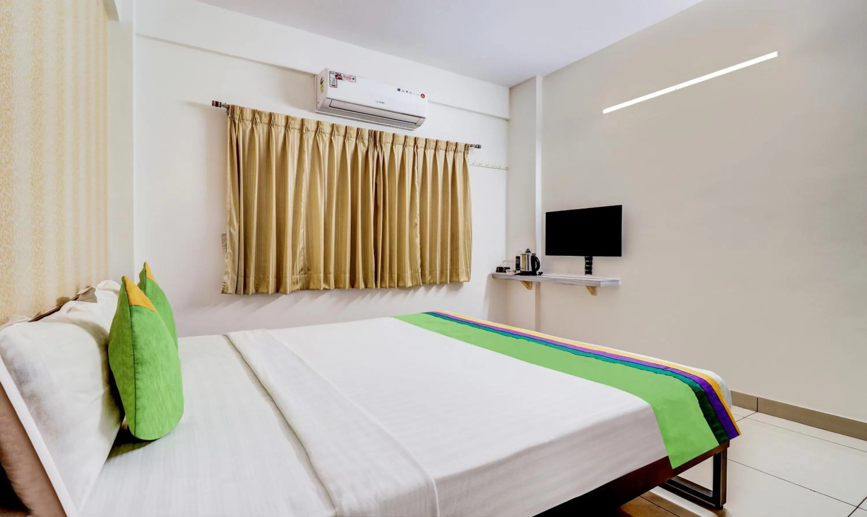 Bedroom, Bed in Treebo Saga Apartment