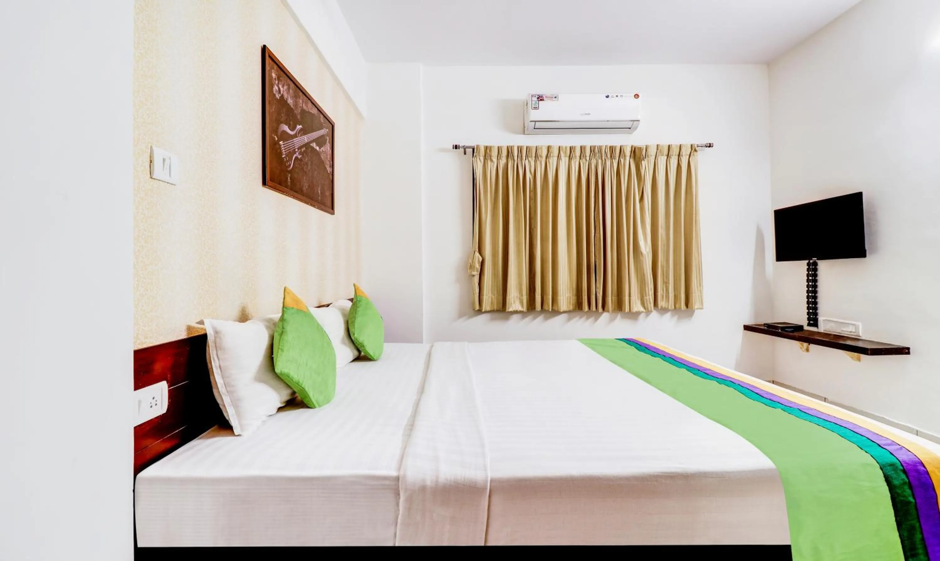 Bedroom, Bed in Treebo Saga Apartment