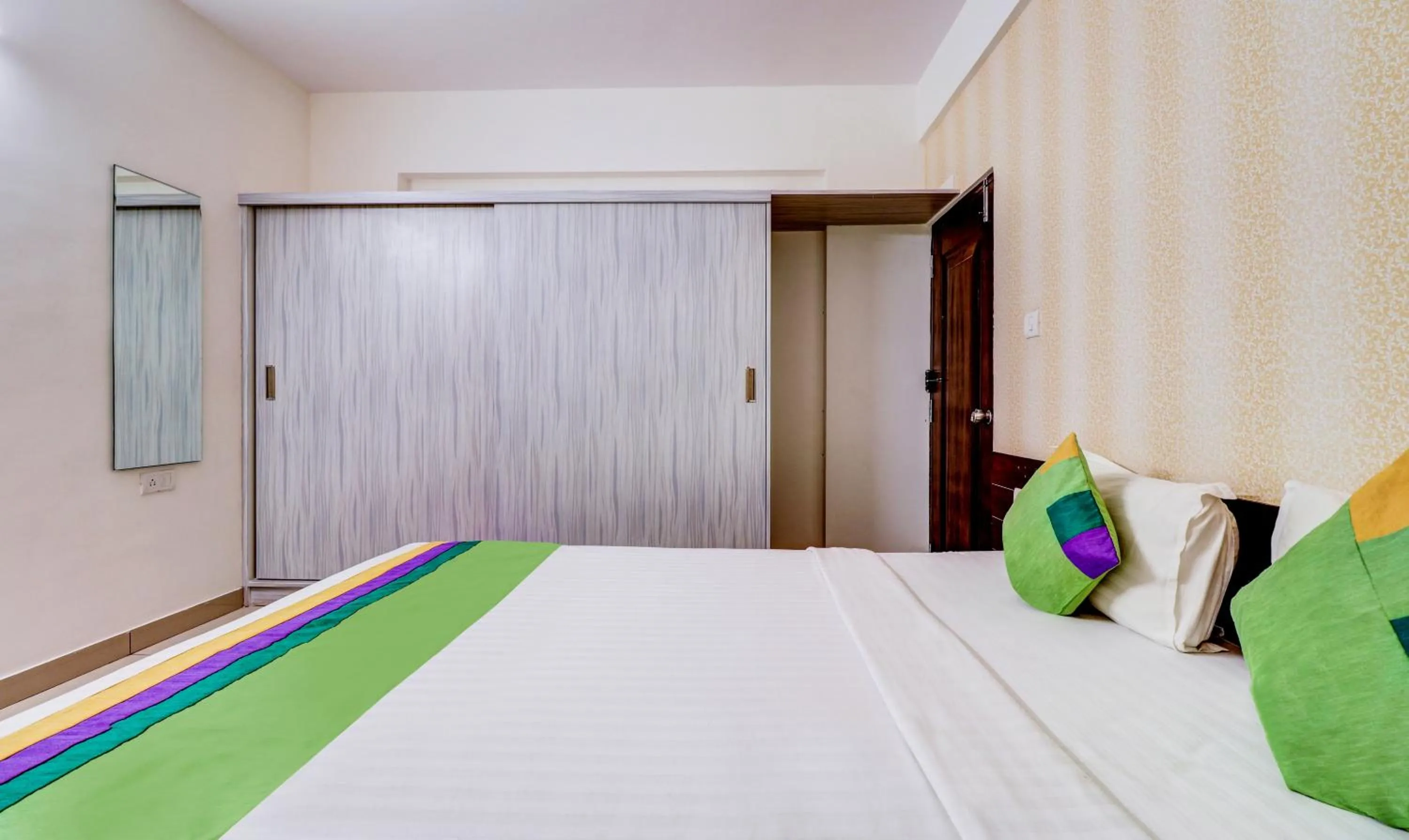 Bedroom, Bed in Treebo Saga Apartment