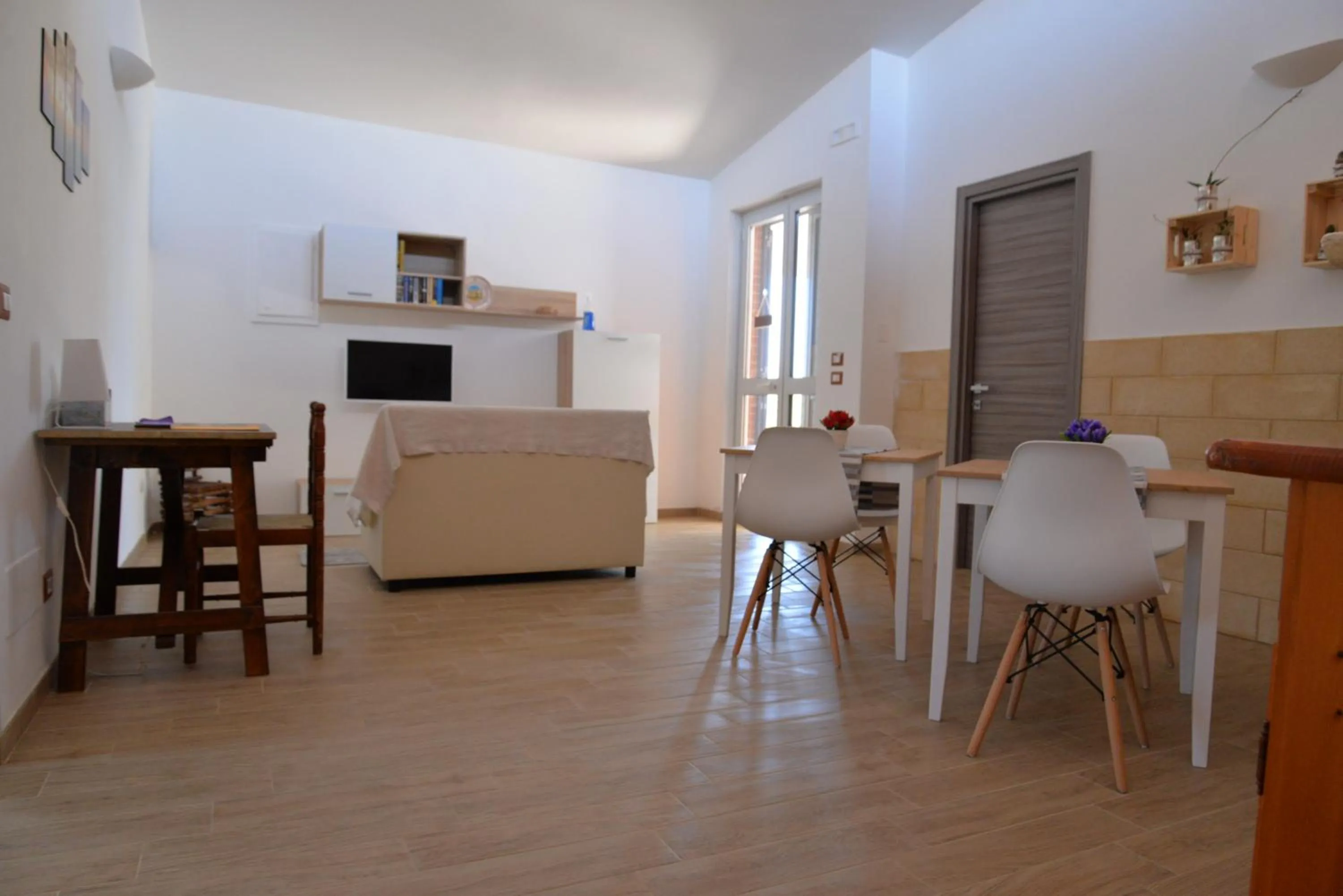 Communal lounge/ TV room in B&B Lara Santola