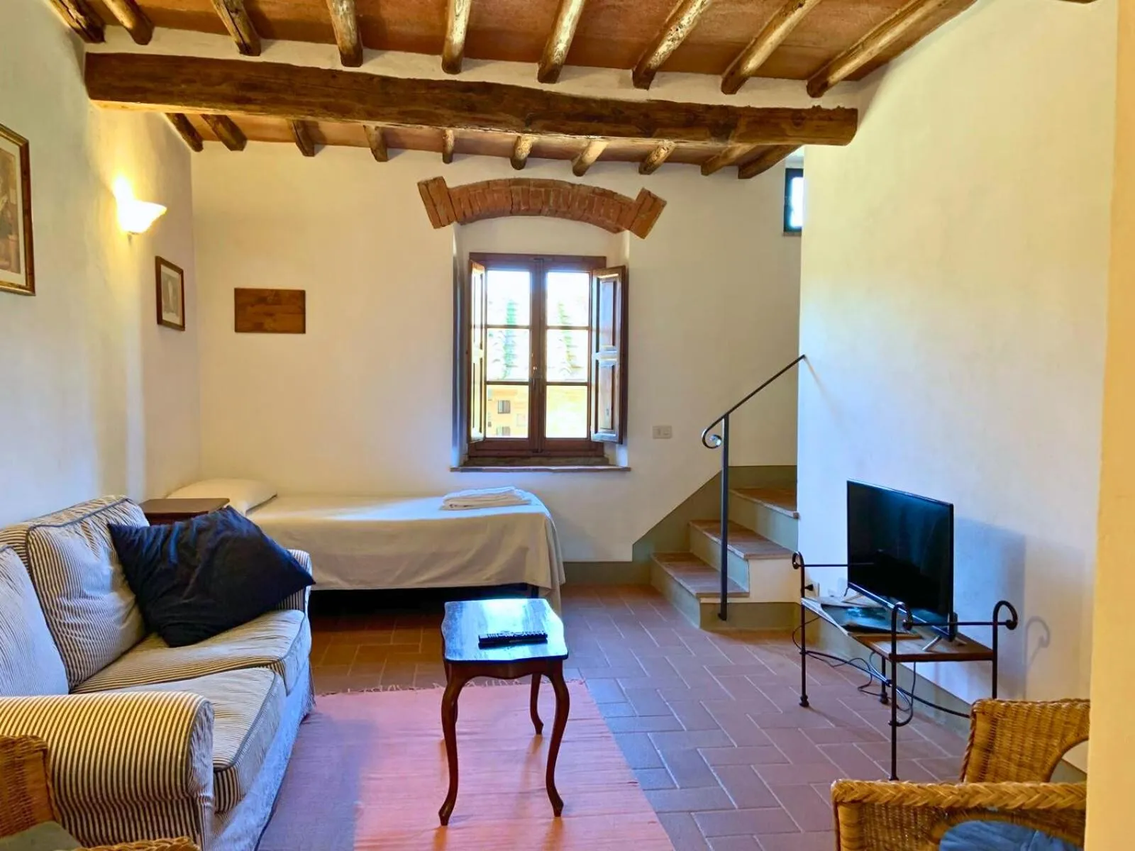 Living room, Bed in Borgo Bottaia