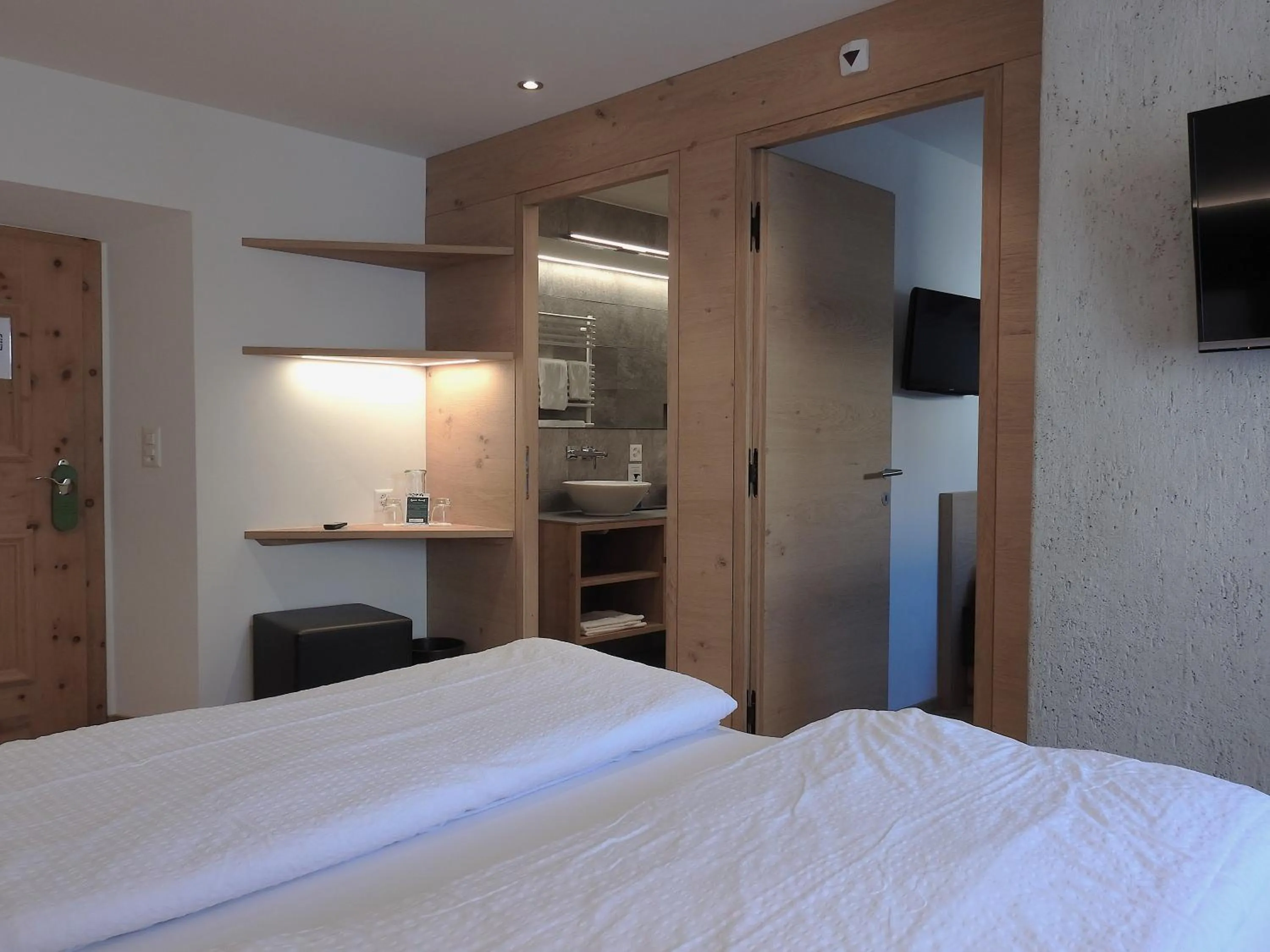 Photo of the whole room, Bed in Hotel Spöl Restaurant