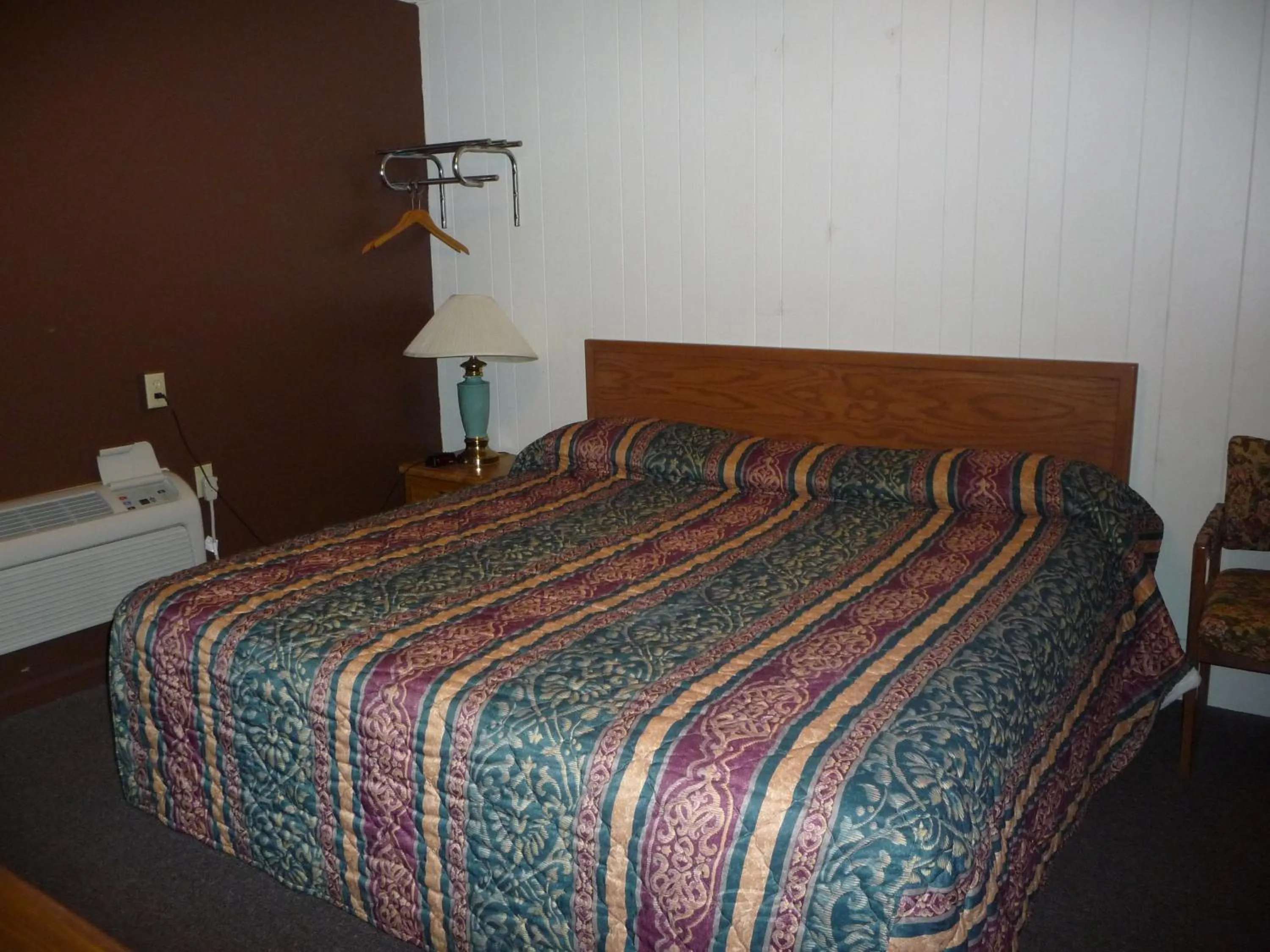 Bed in Red Rose Motel