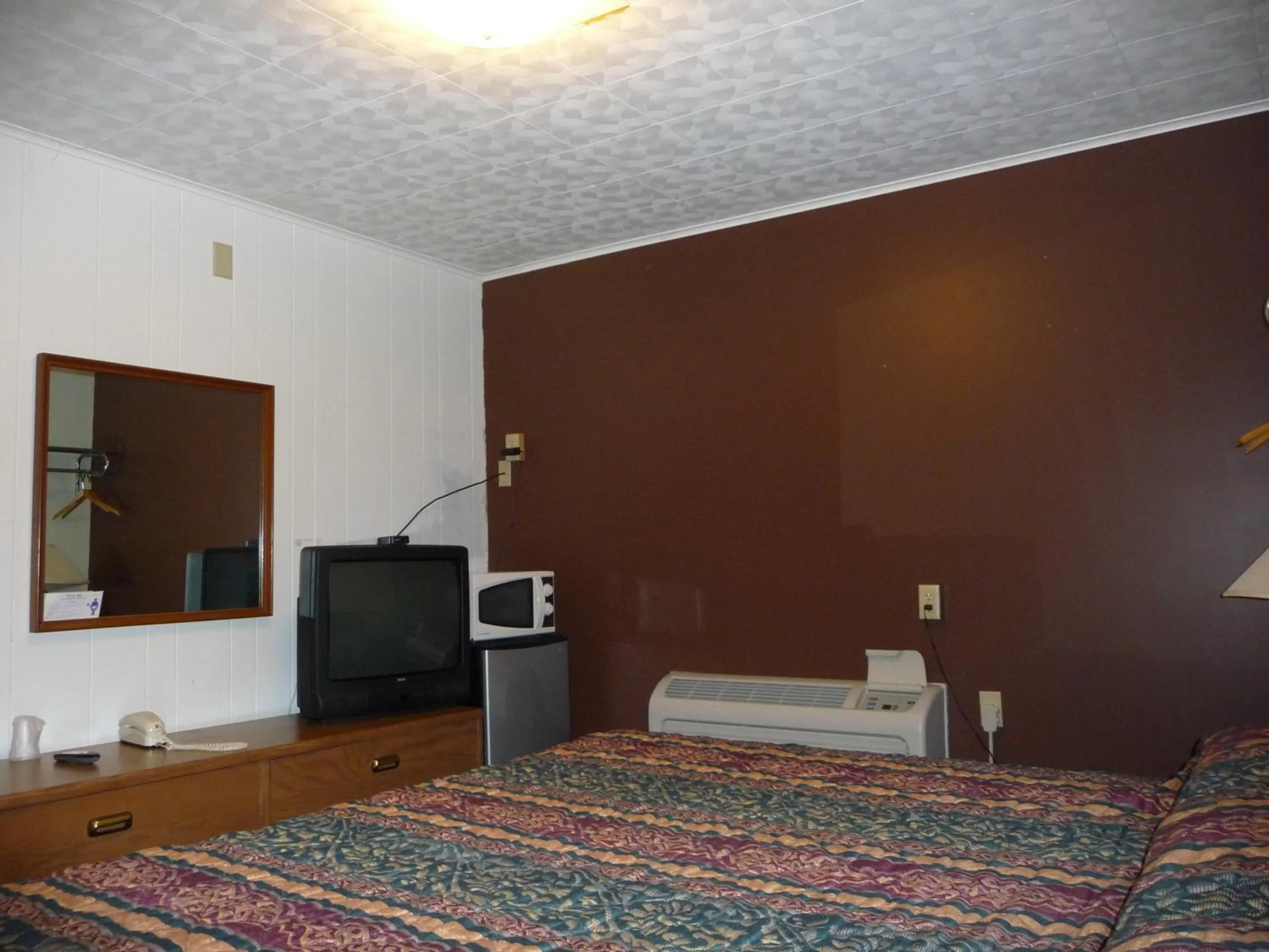 Bed in Red Rose Motel