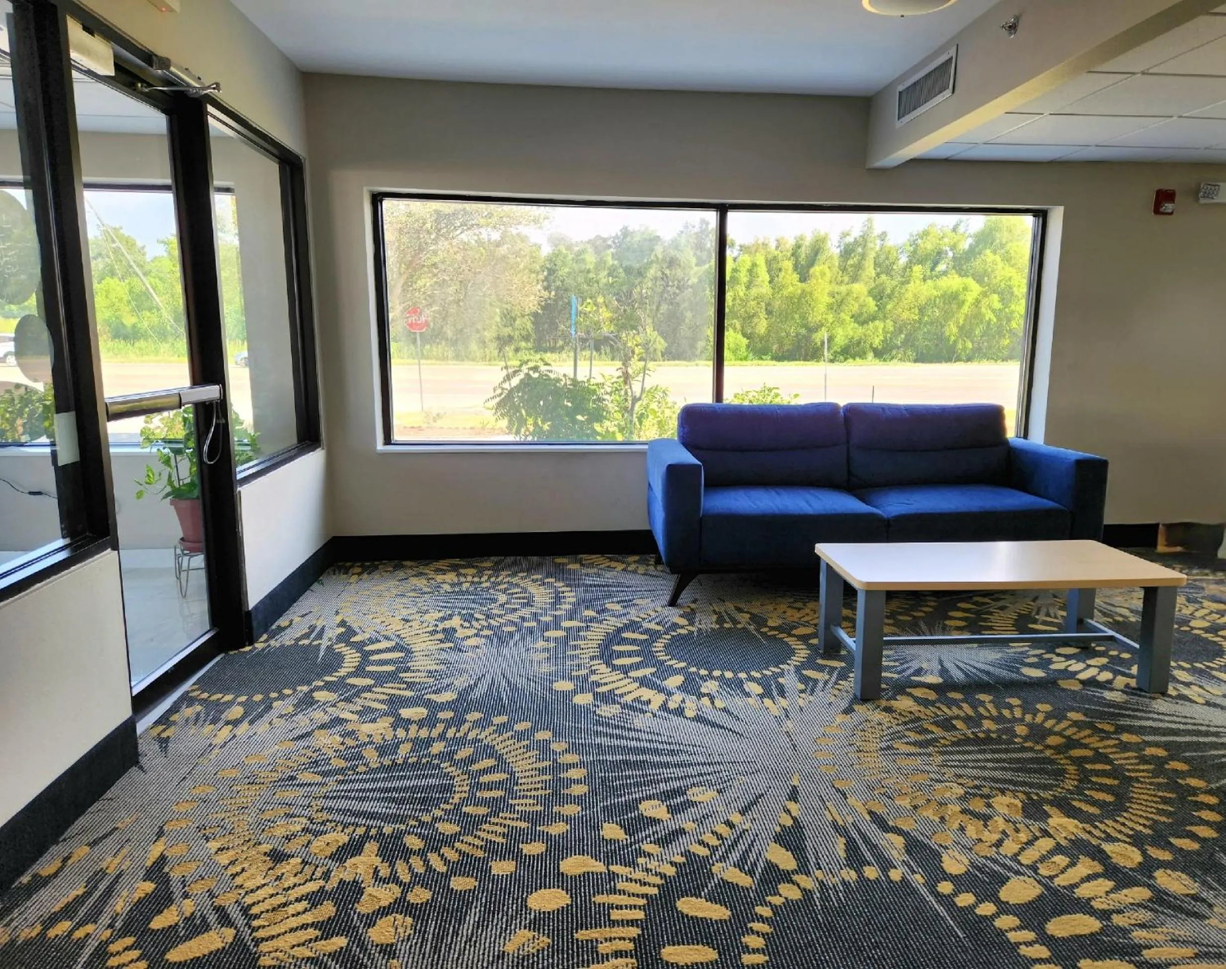 Lobby or reception in Days Inn by Wyndham LaPlace- New Orleans