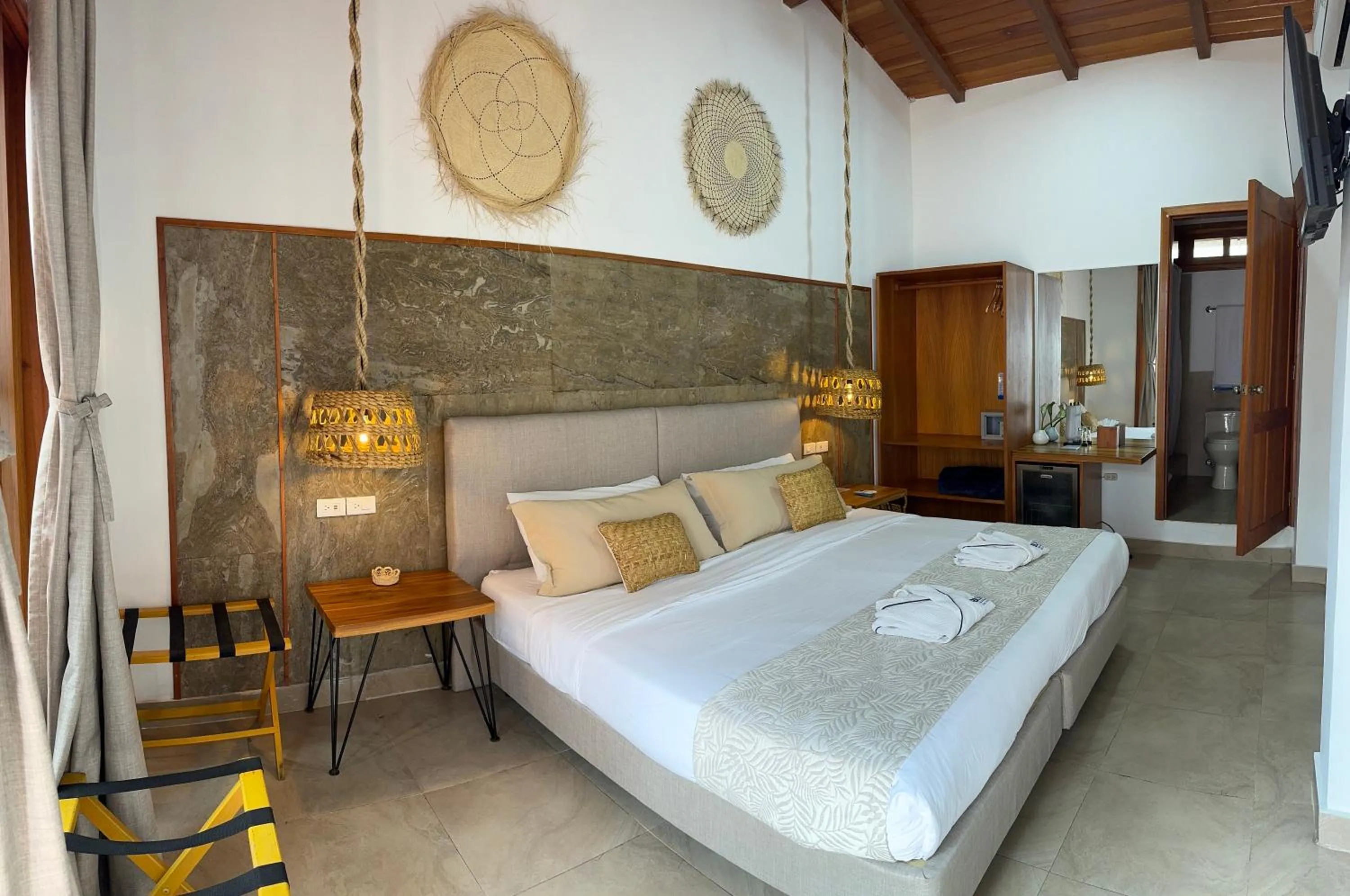 Bed in Blu Galapagos Sustainable Waterfront Lodge