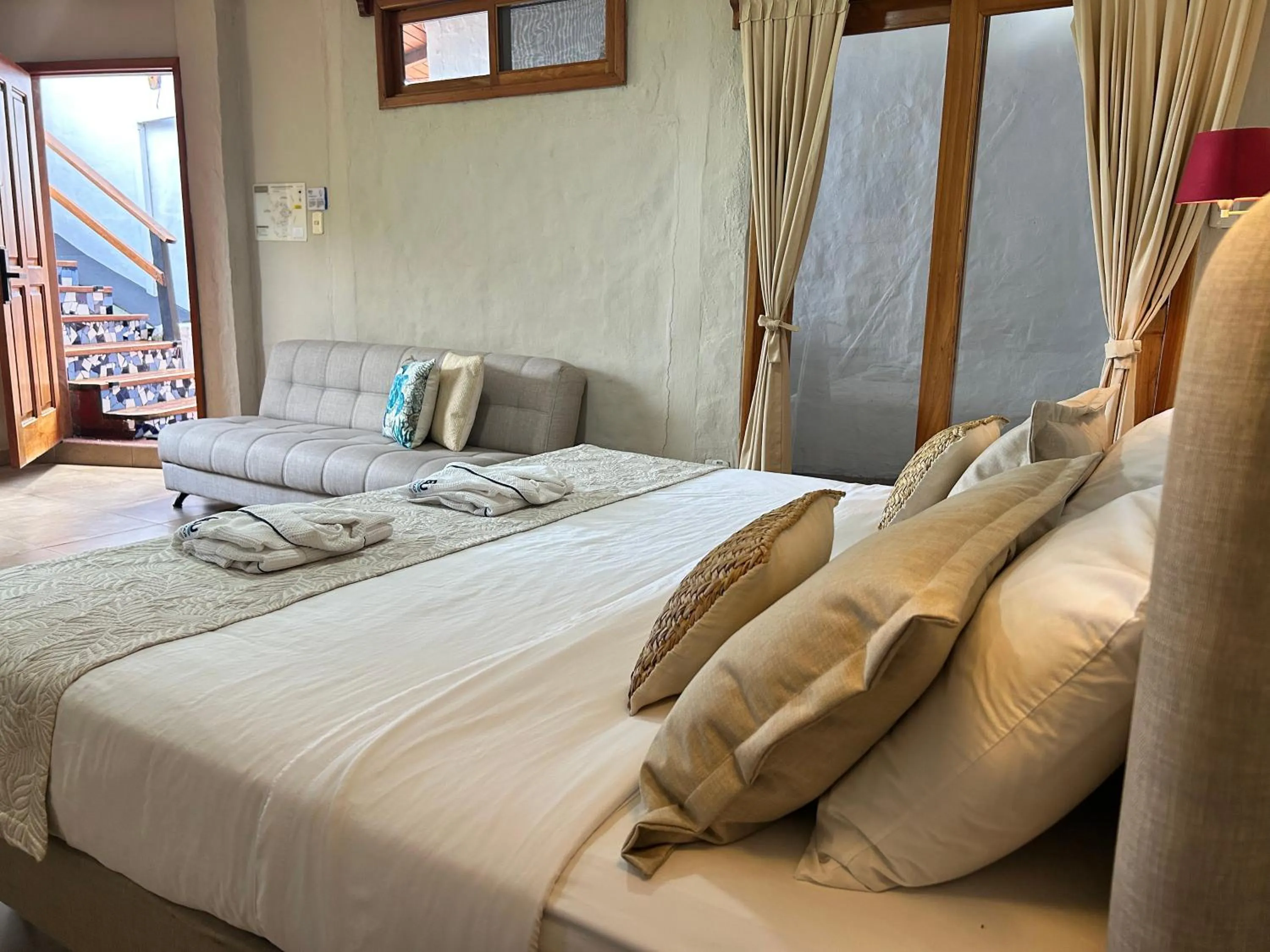 Bed in Blu Galapagos Sustainable Waterfront Lodge