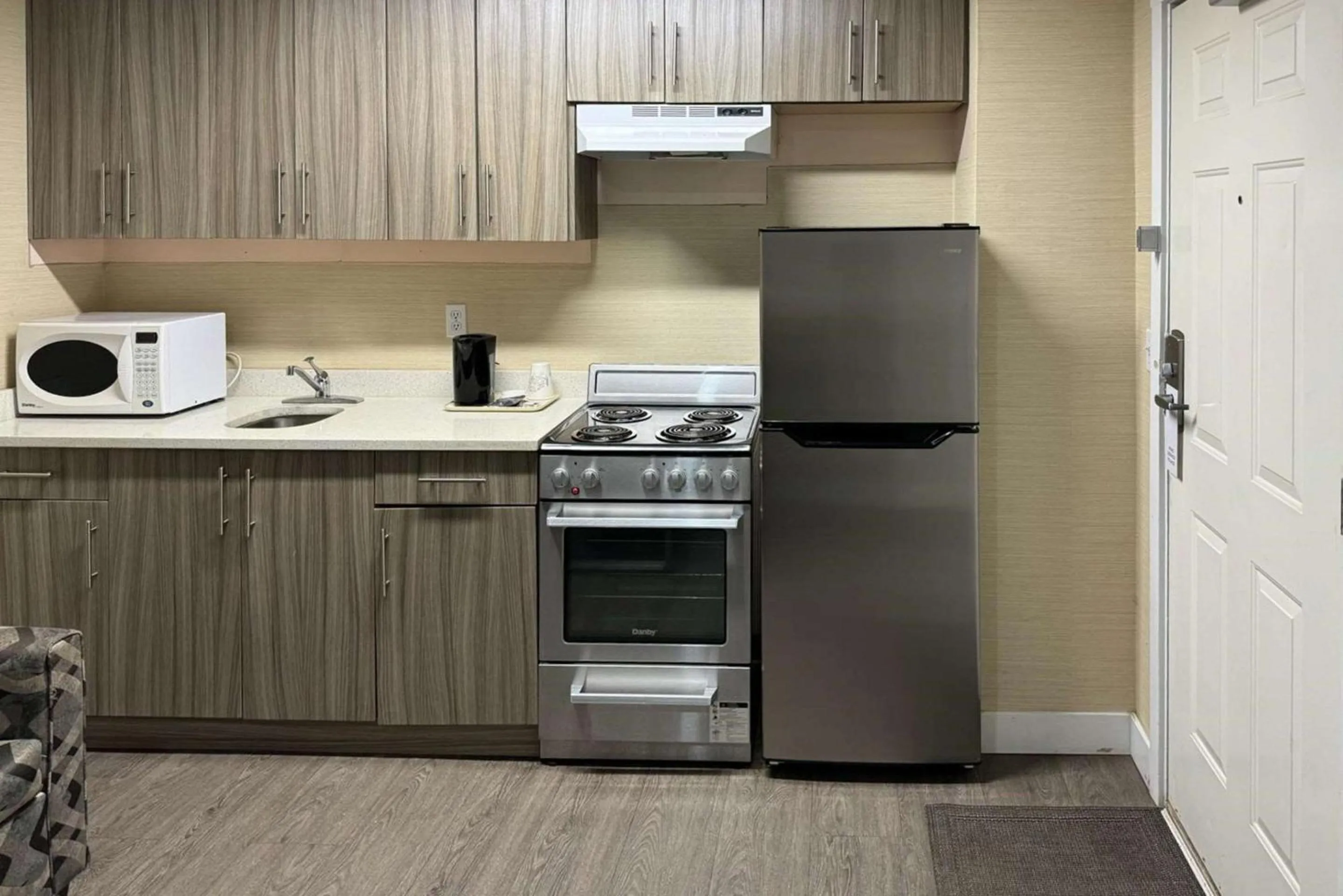 Bedroom in Rodeway Inn & Suites