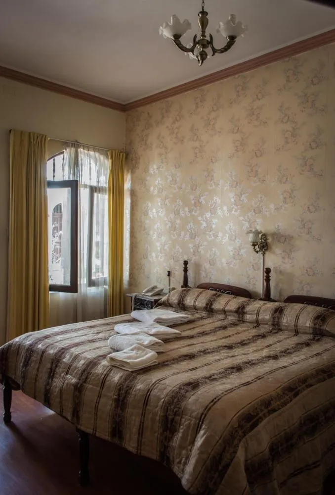 Photo of the whole room, Bed in Hostal Sucre