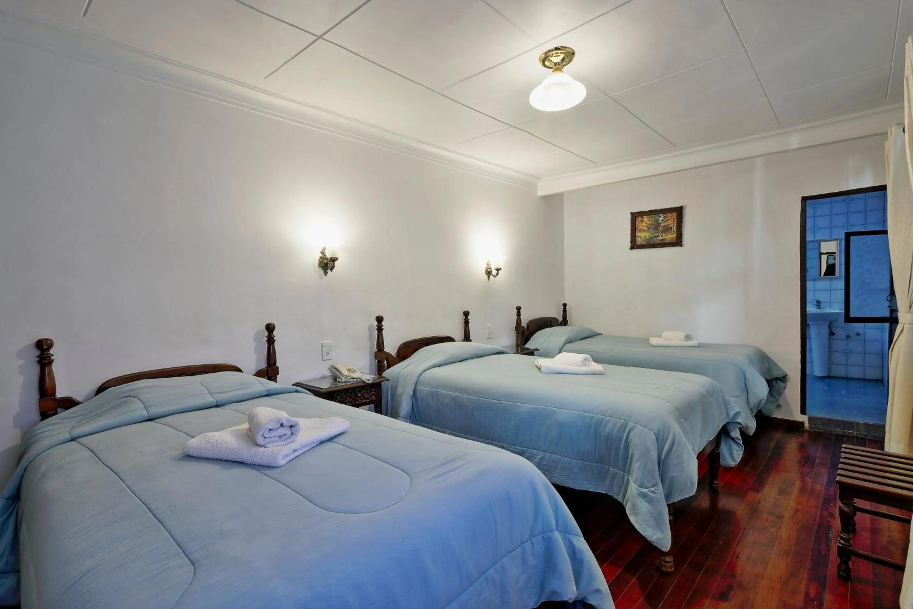 towels, Bed in Hostal Sucre