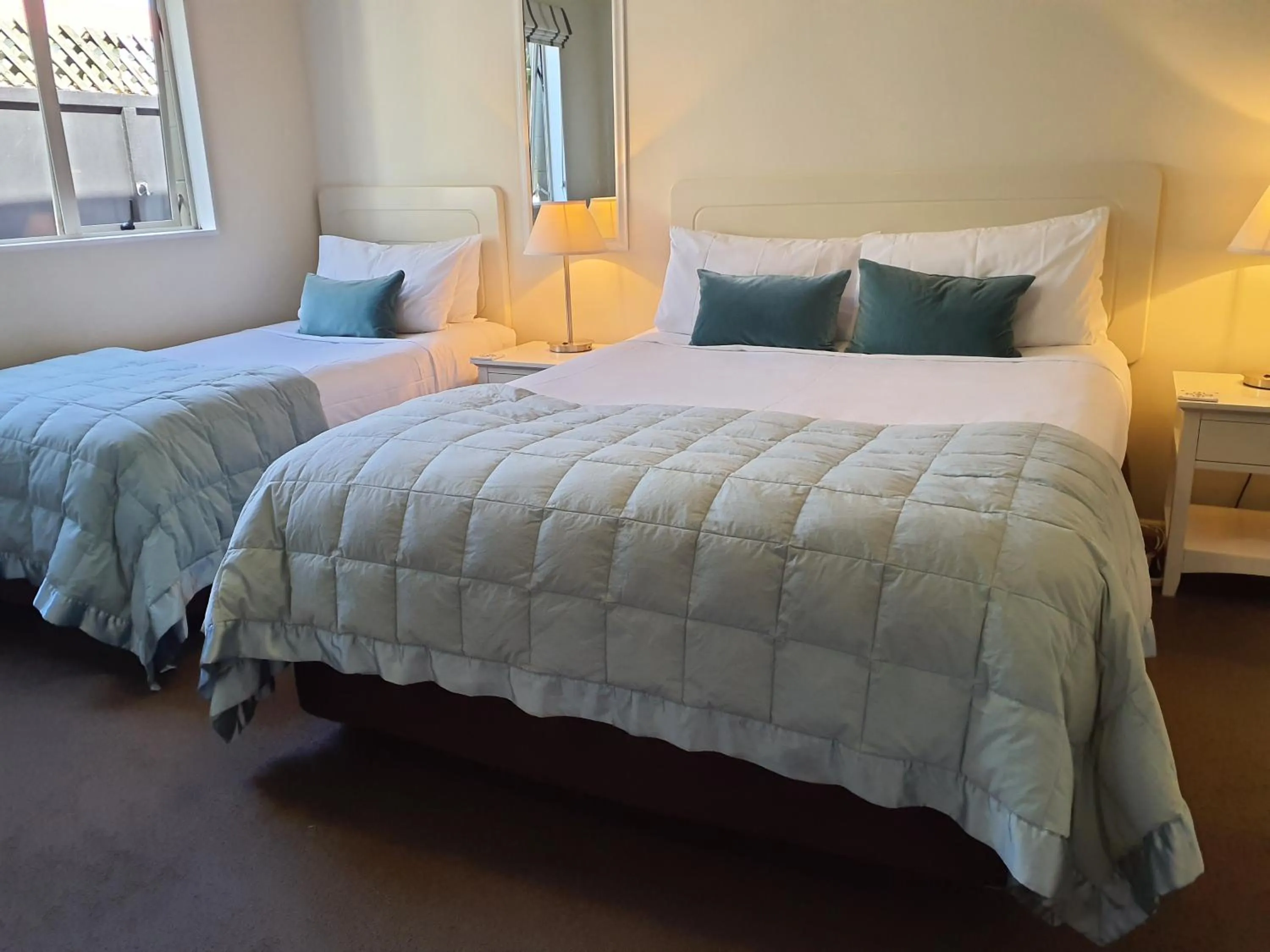 Bed in Tuscana Motor Lodge