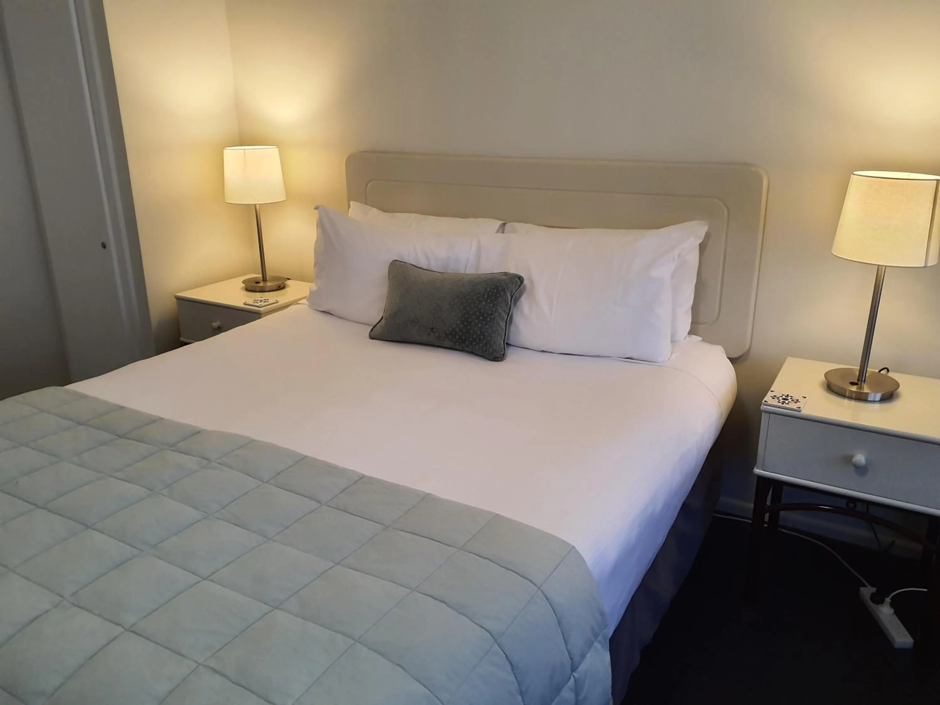 Bed in Tuscana Motor Lodge