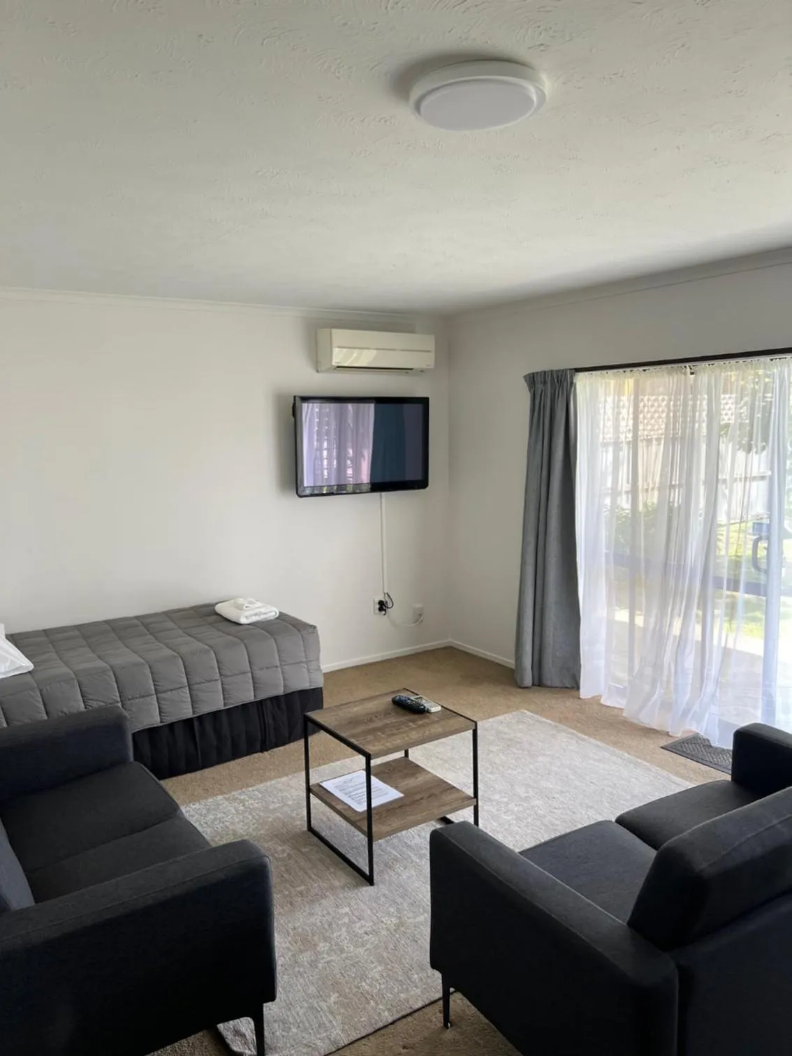 Bed in Garden City Motel