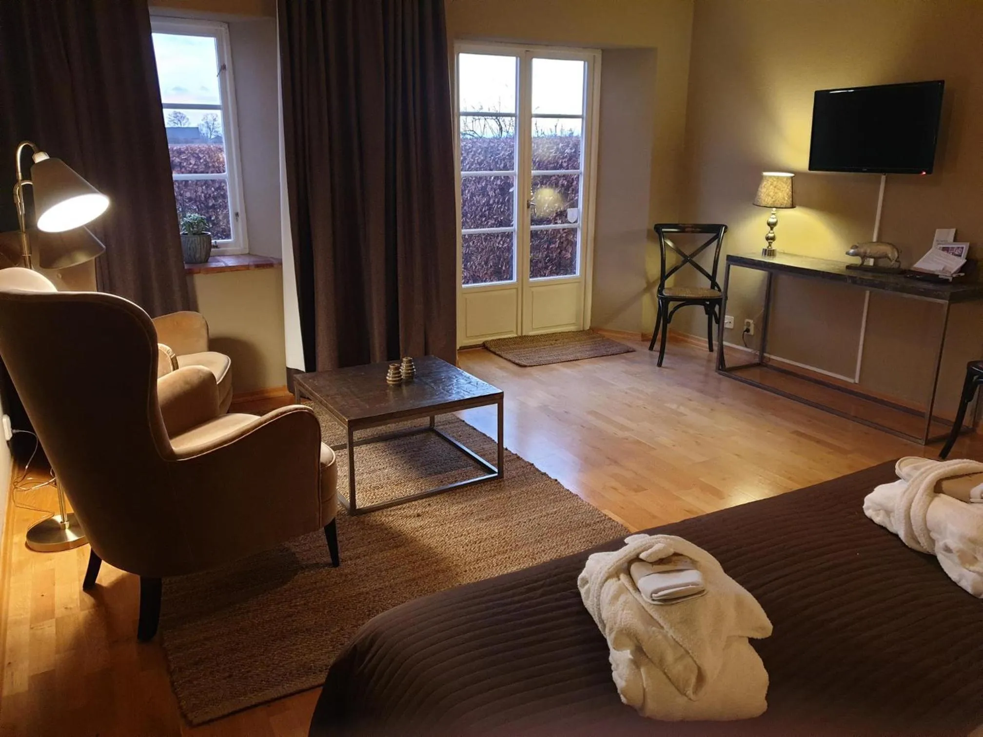 Photo of the whole room, Bed in Örums Nygård Gårdshotell