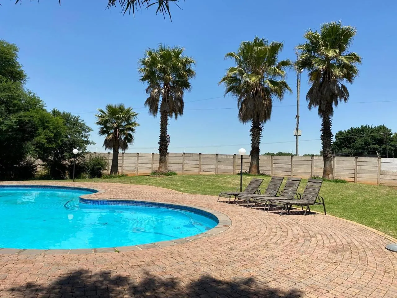 Swimming pool in Be My Guest Hotel Conference