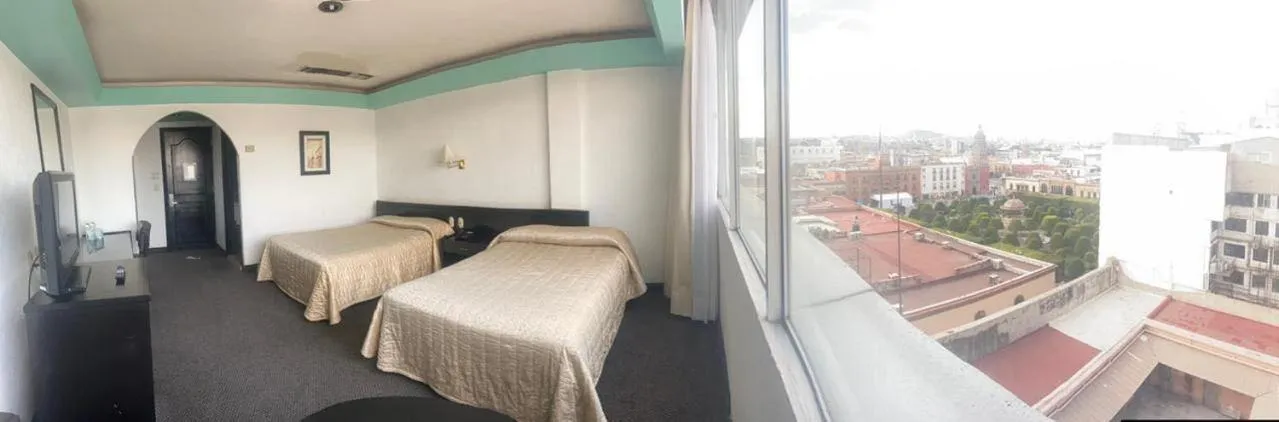 Bed in Hotel Real Rex