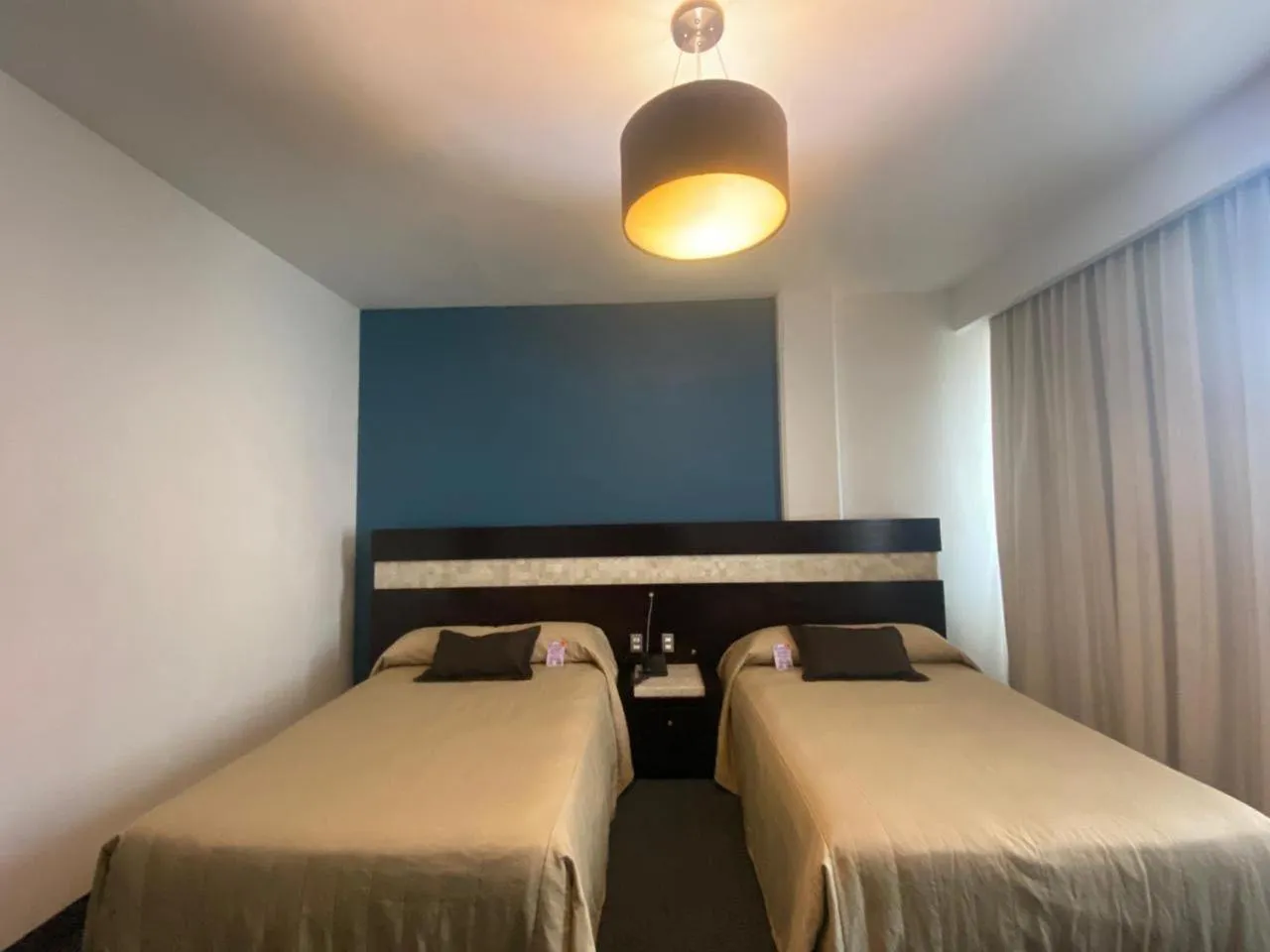 Bed in Hotel Real Rex