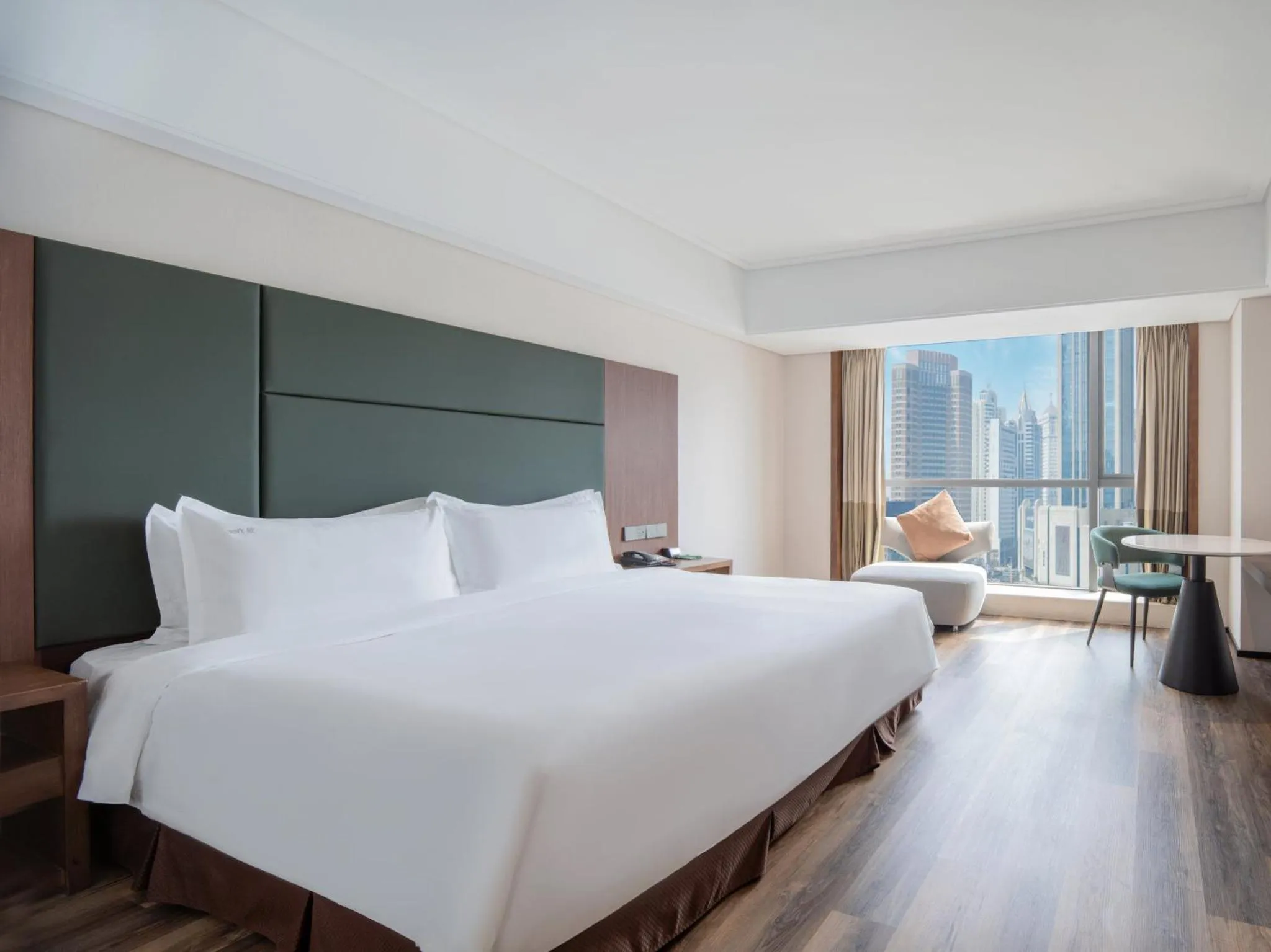 Photo of the whole room, Bed in Holiday Inn Qingdao City Center by IHG - May 4th Square