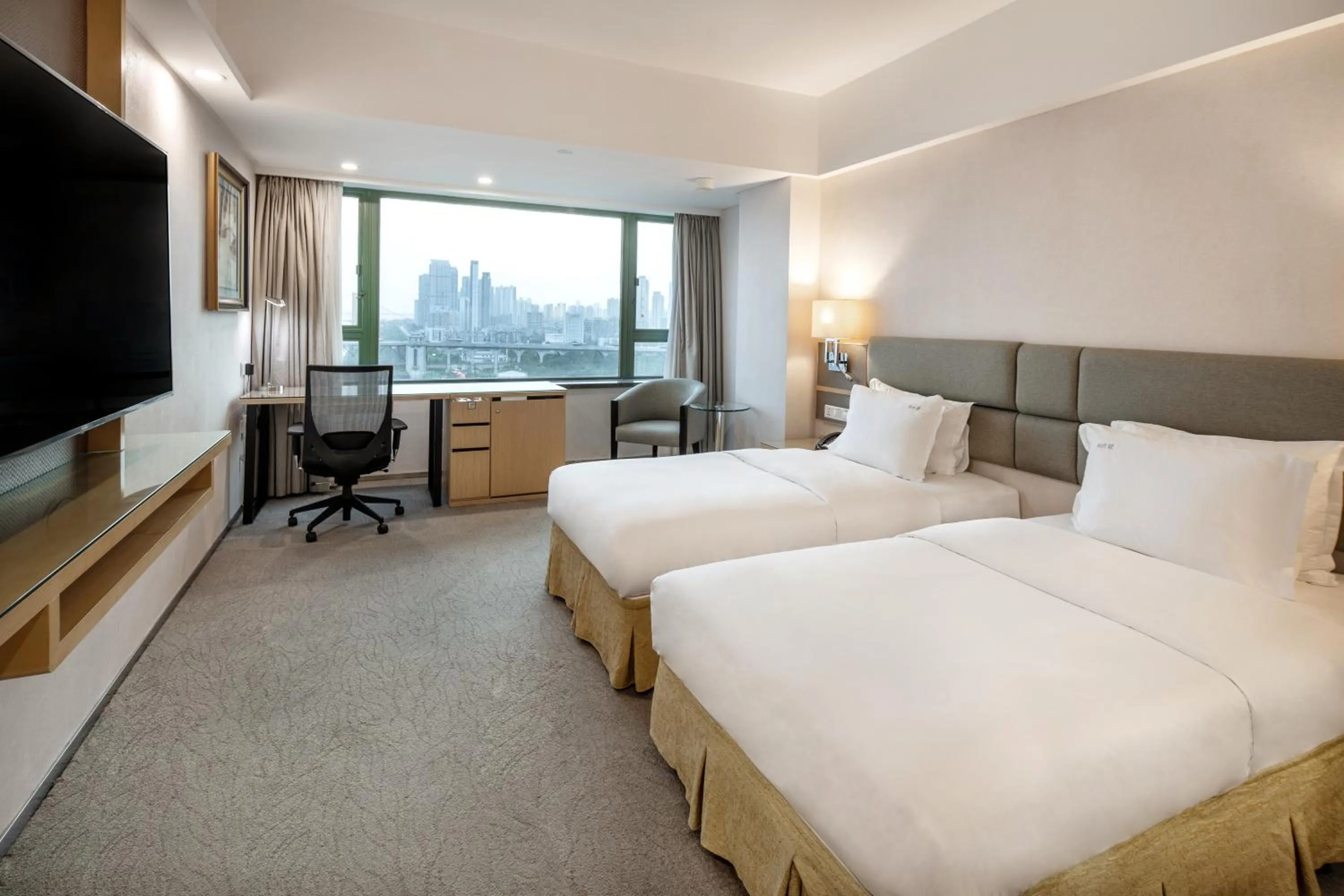 Bed in Holiday Inn Wuhan Riverside by IHG