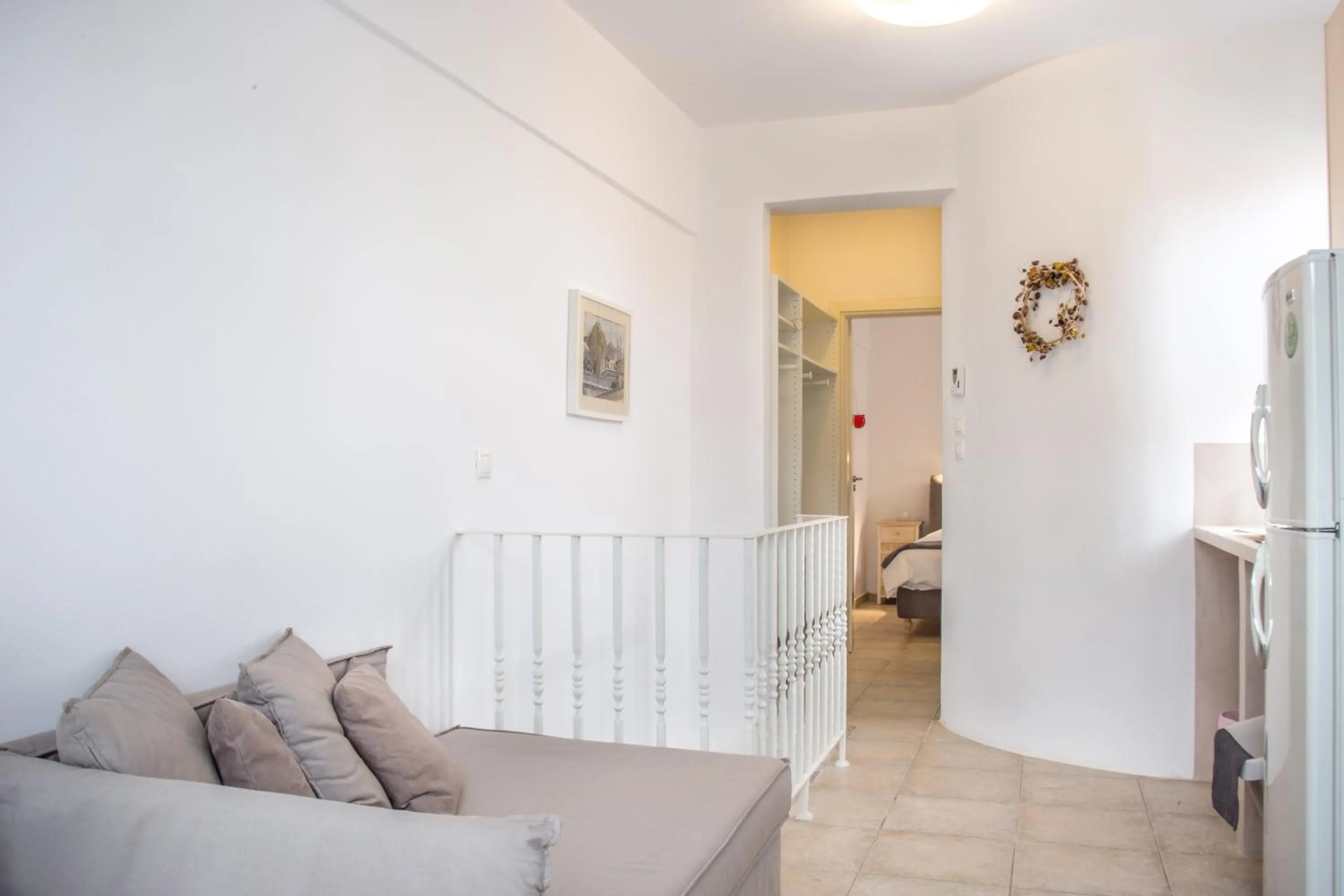 Seating area, Bed in Anemomiloi Studios