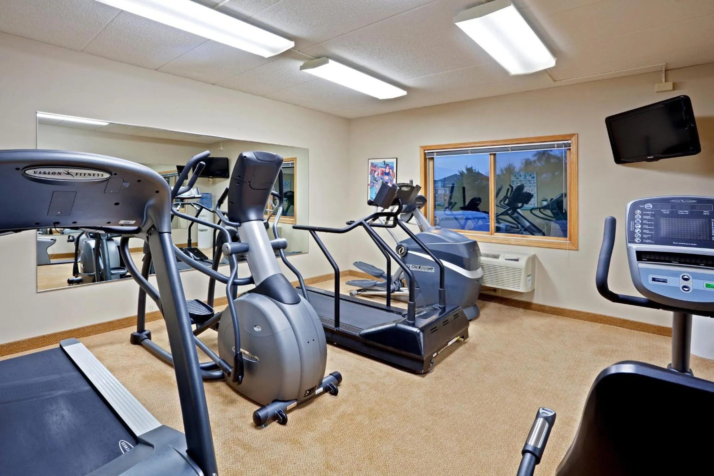 Fitness centre/facilities in AmericInn by Wyndham Chanhassen