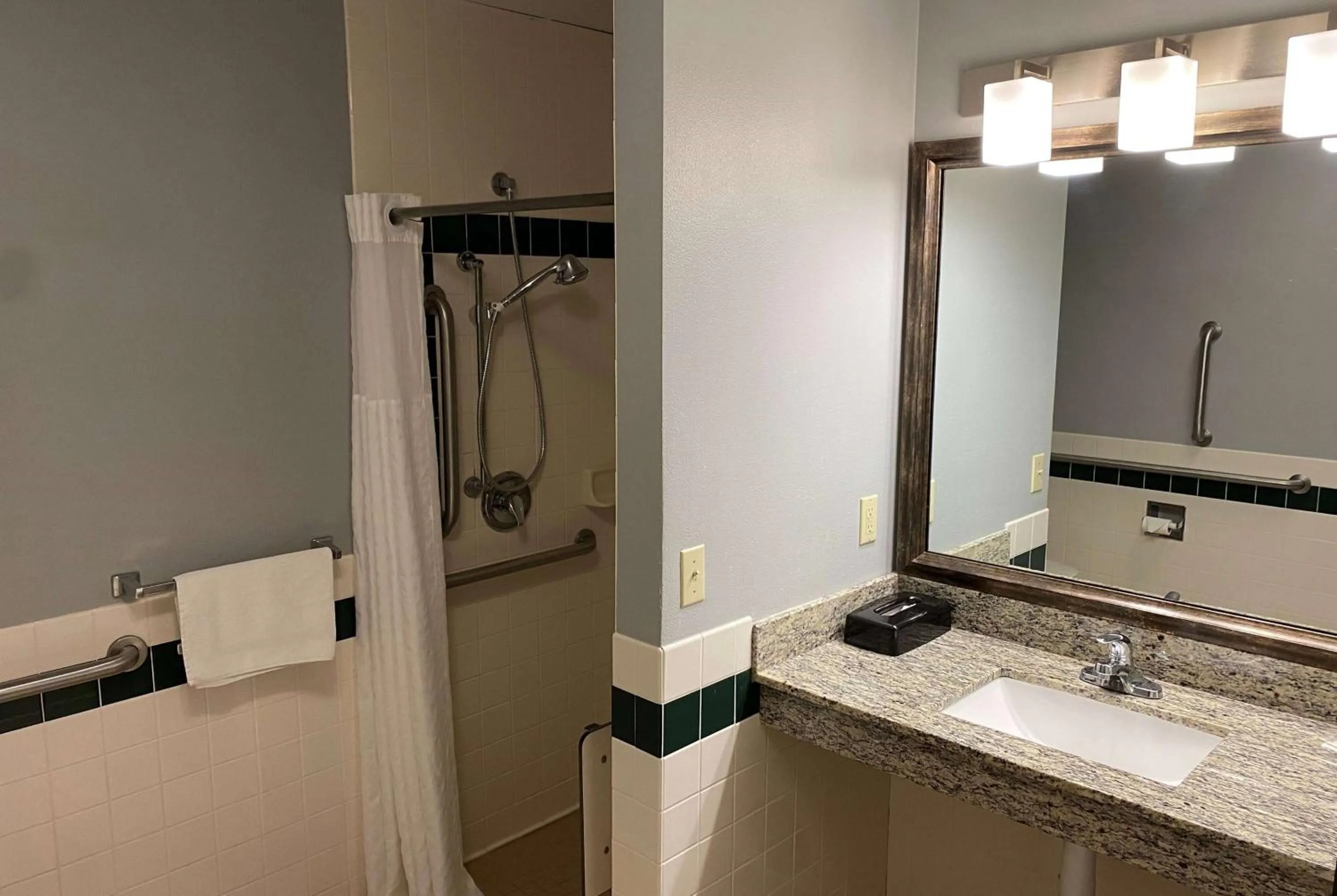 Bathroom in AmericInn by Wyndham Chanhassen