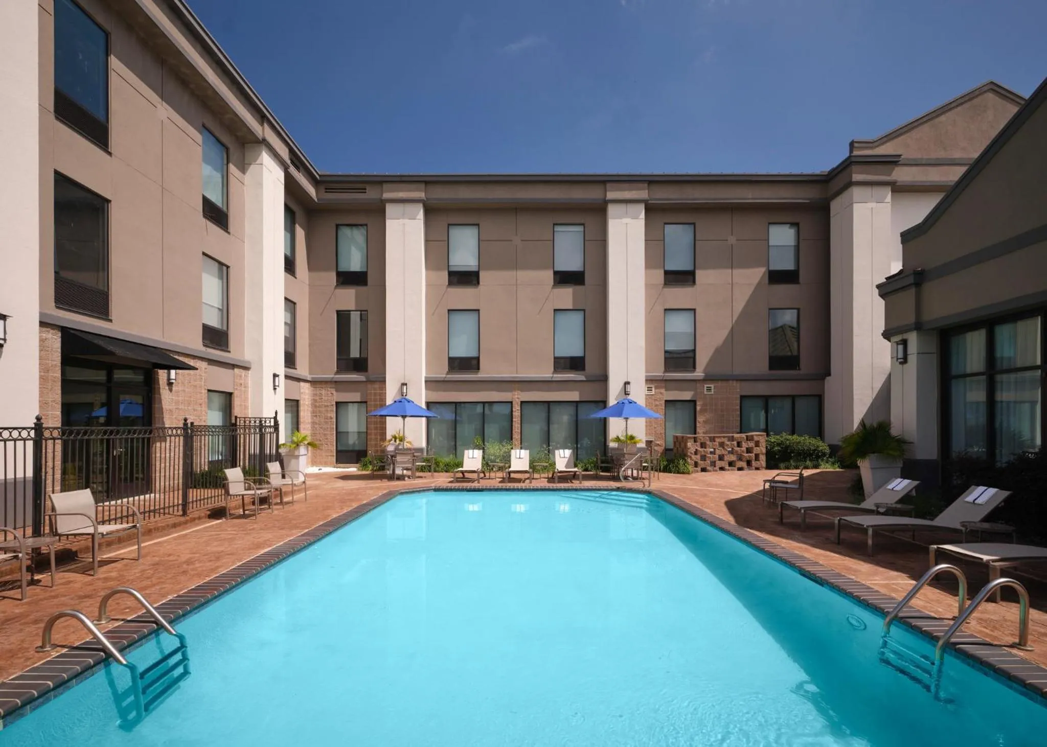Swimming pool in Holiday Inn Express and Suites New Orleans Airport by IHG