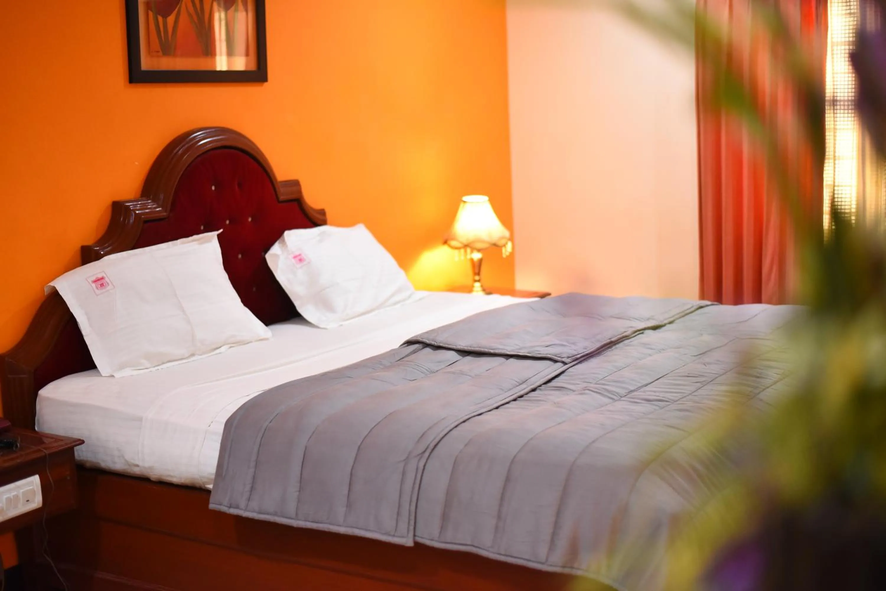 Bed in Hotel Subhalakshmi Palace