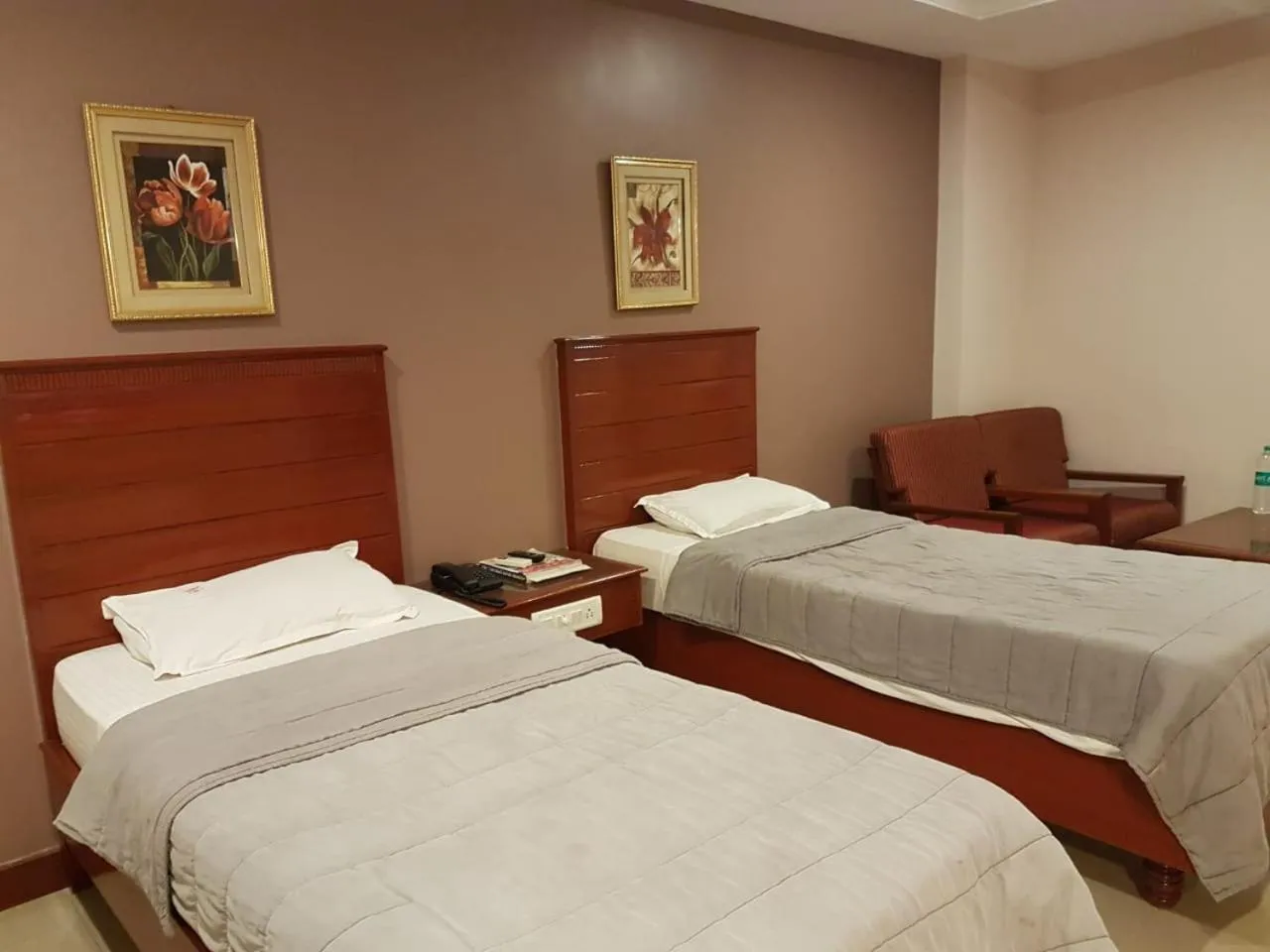 Bed in Hotel Subhalakshmi Palace