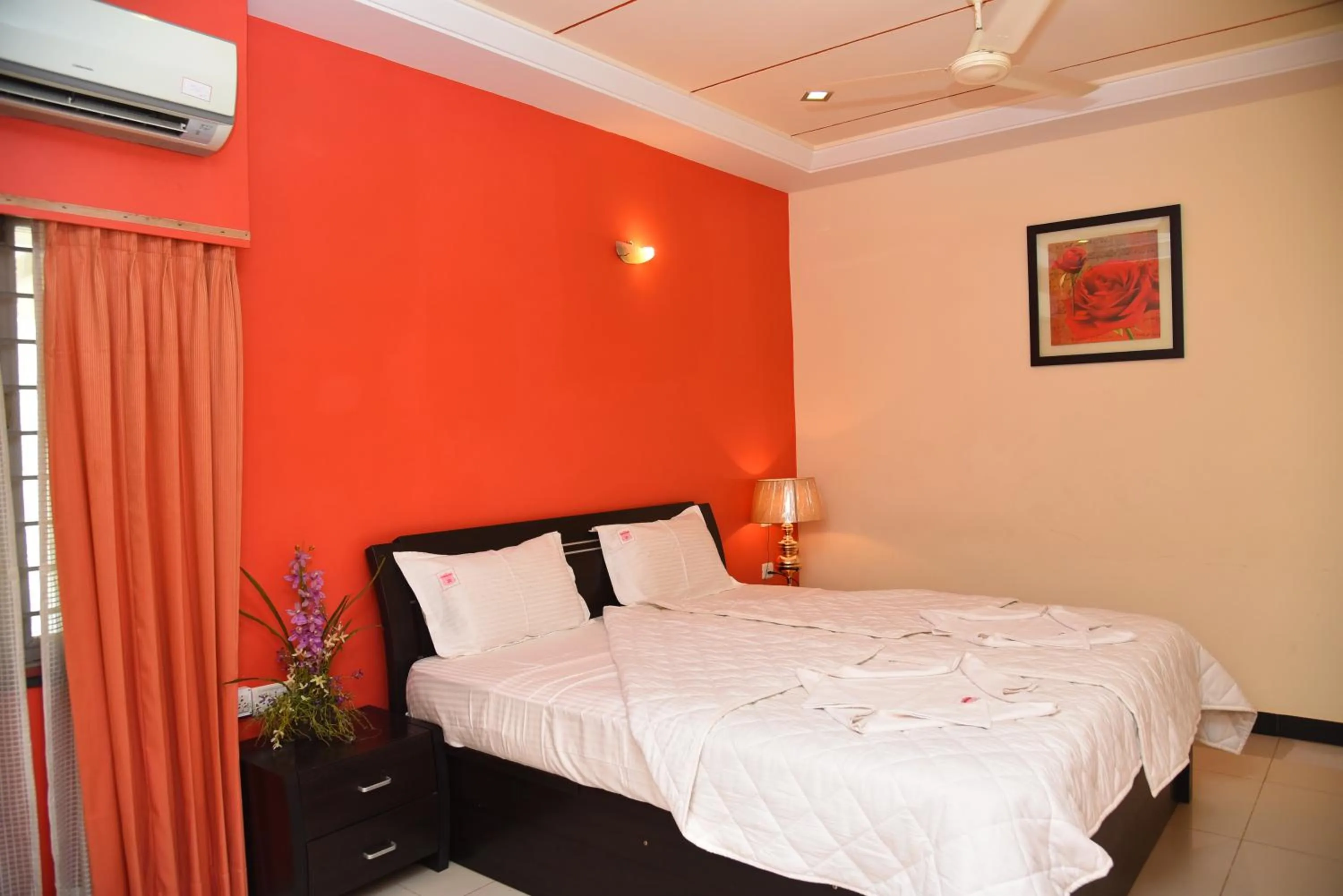 Bed in Hotel Subhalakshmi Palace