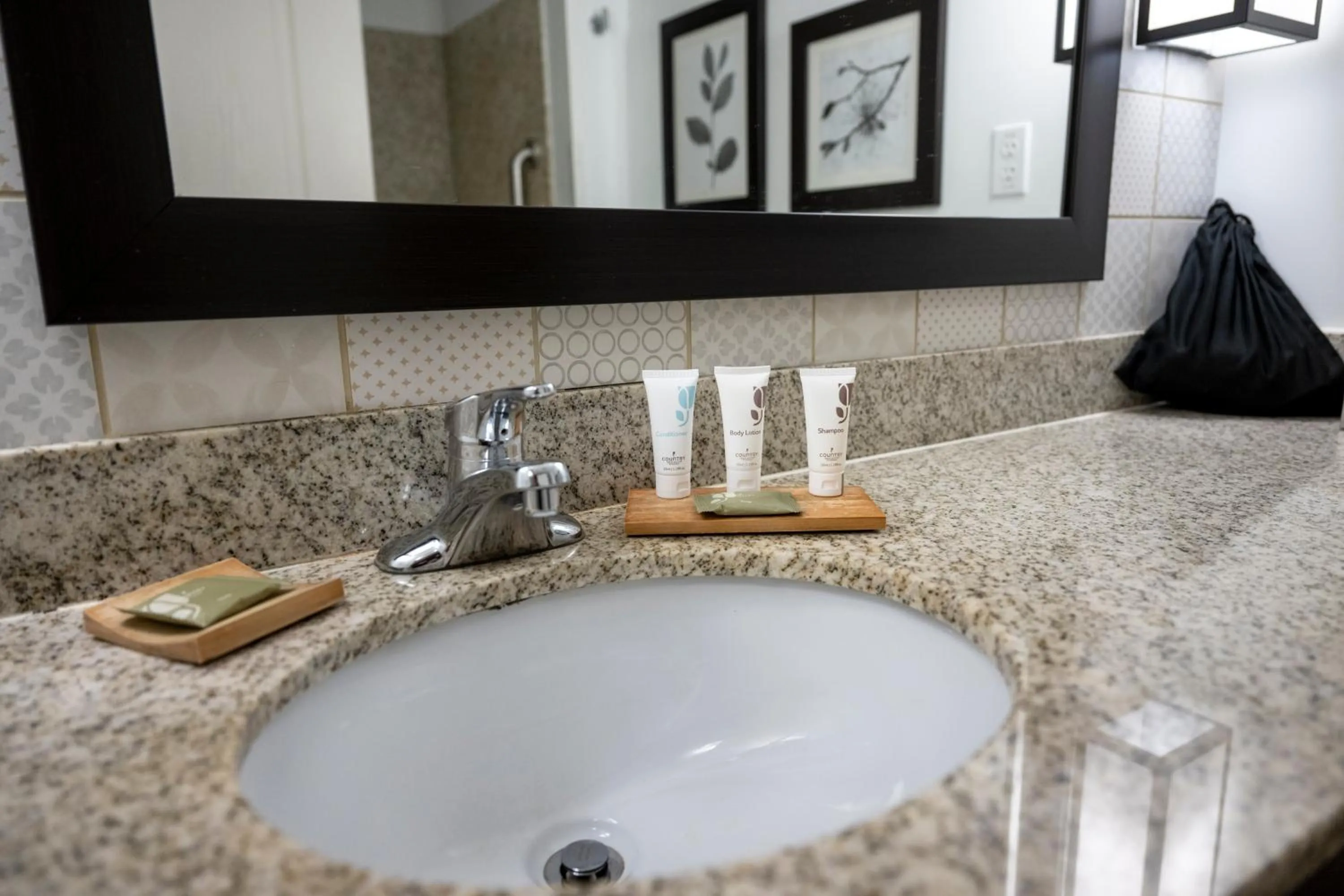 Bathroom in Country Inn & Suites by Radisson, Queensbury - Lake George , NY