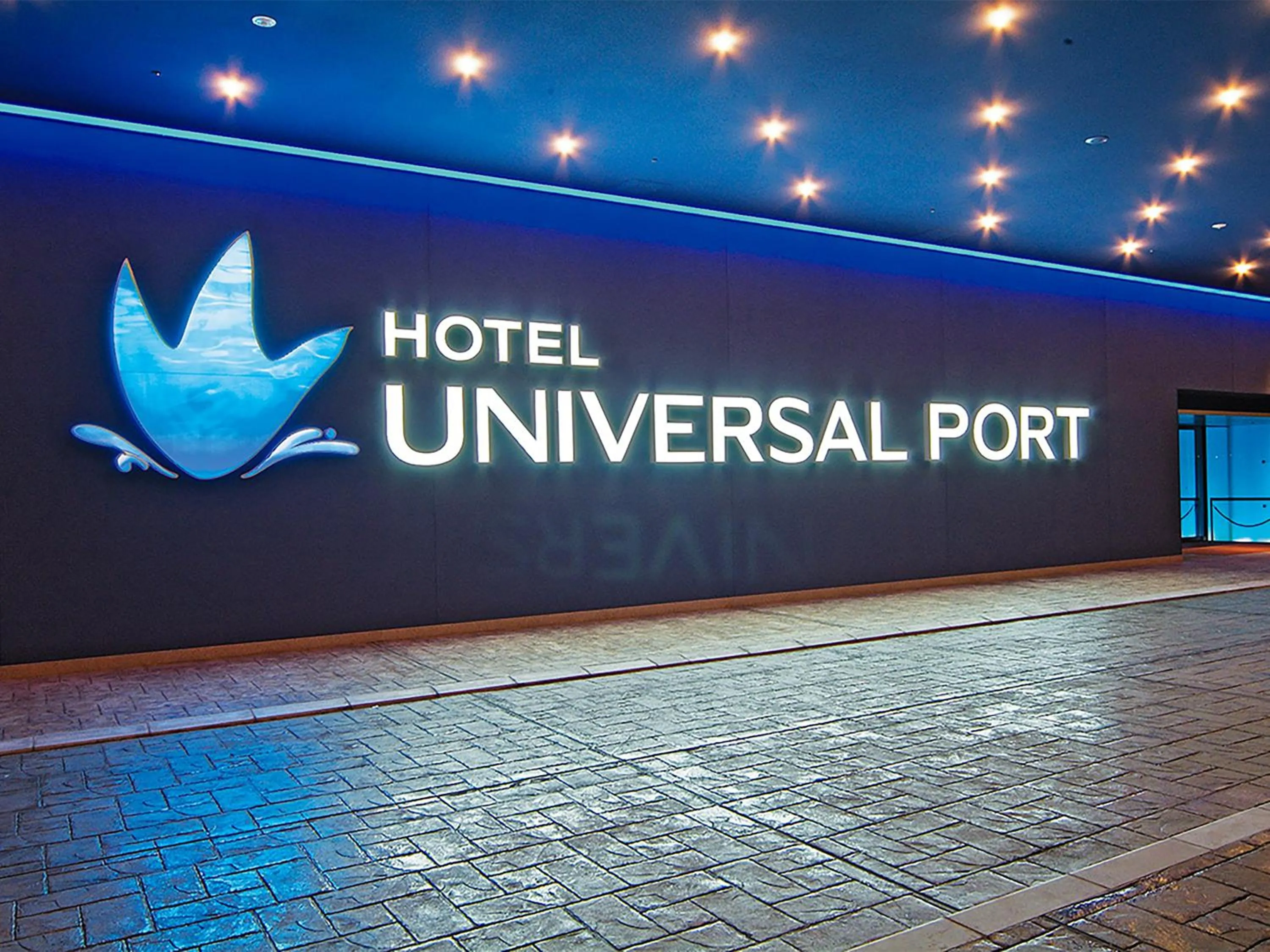 Property logo or sign in Hotel Universal Port