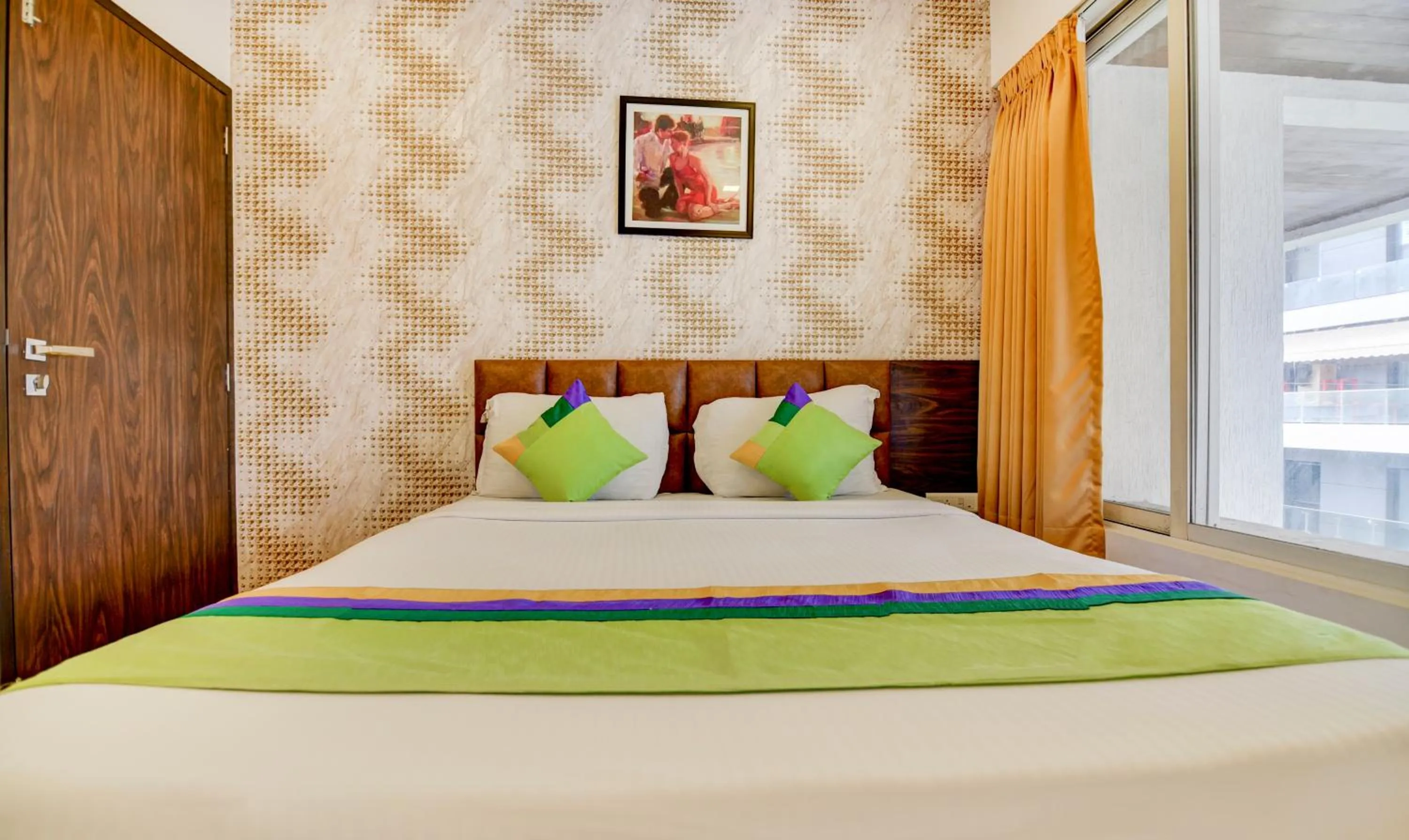 Bed in Treebo Kuval Inn