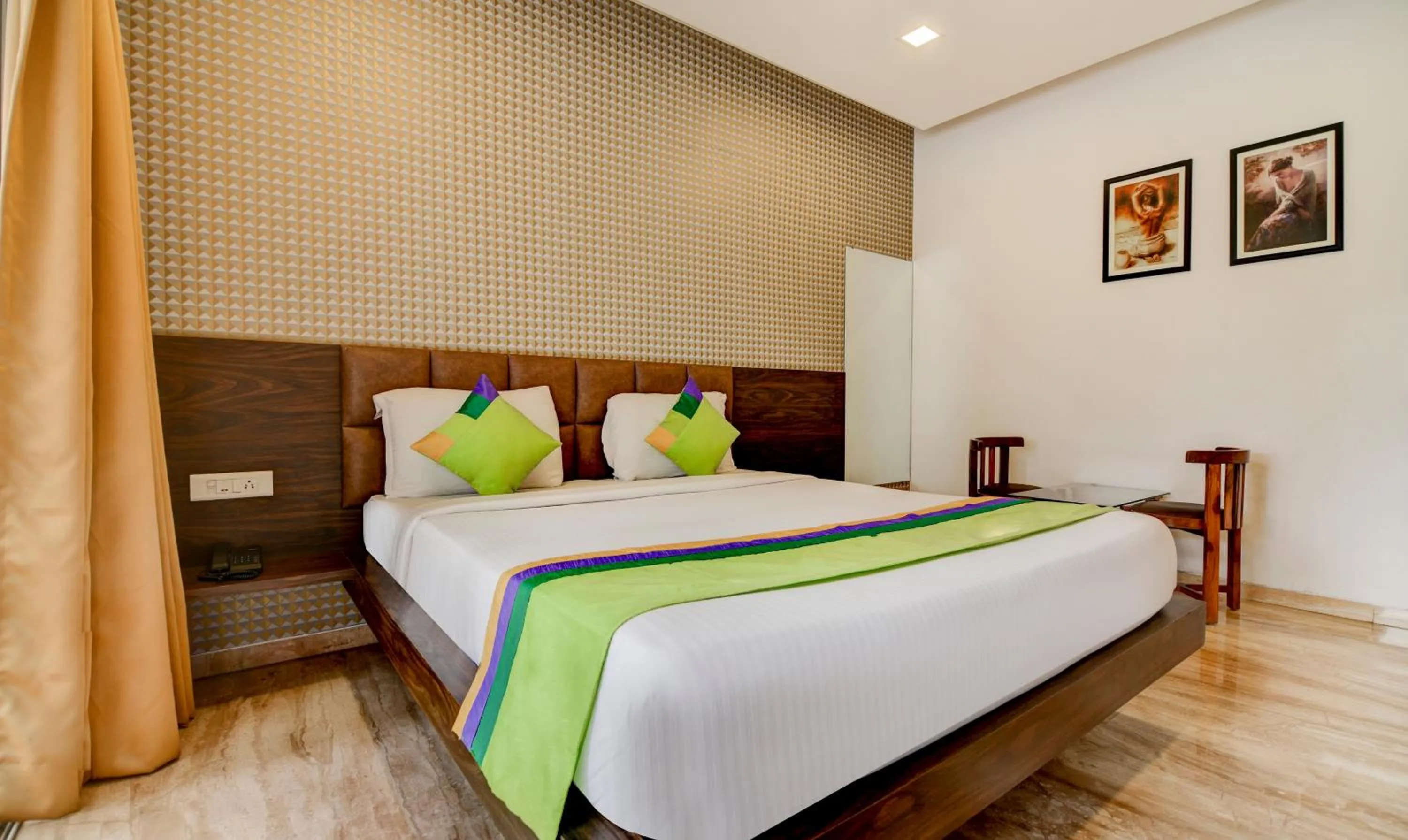 Bed in Treebo Kuval Inn