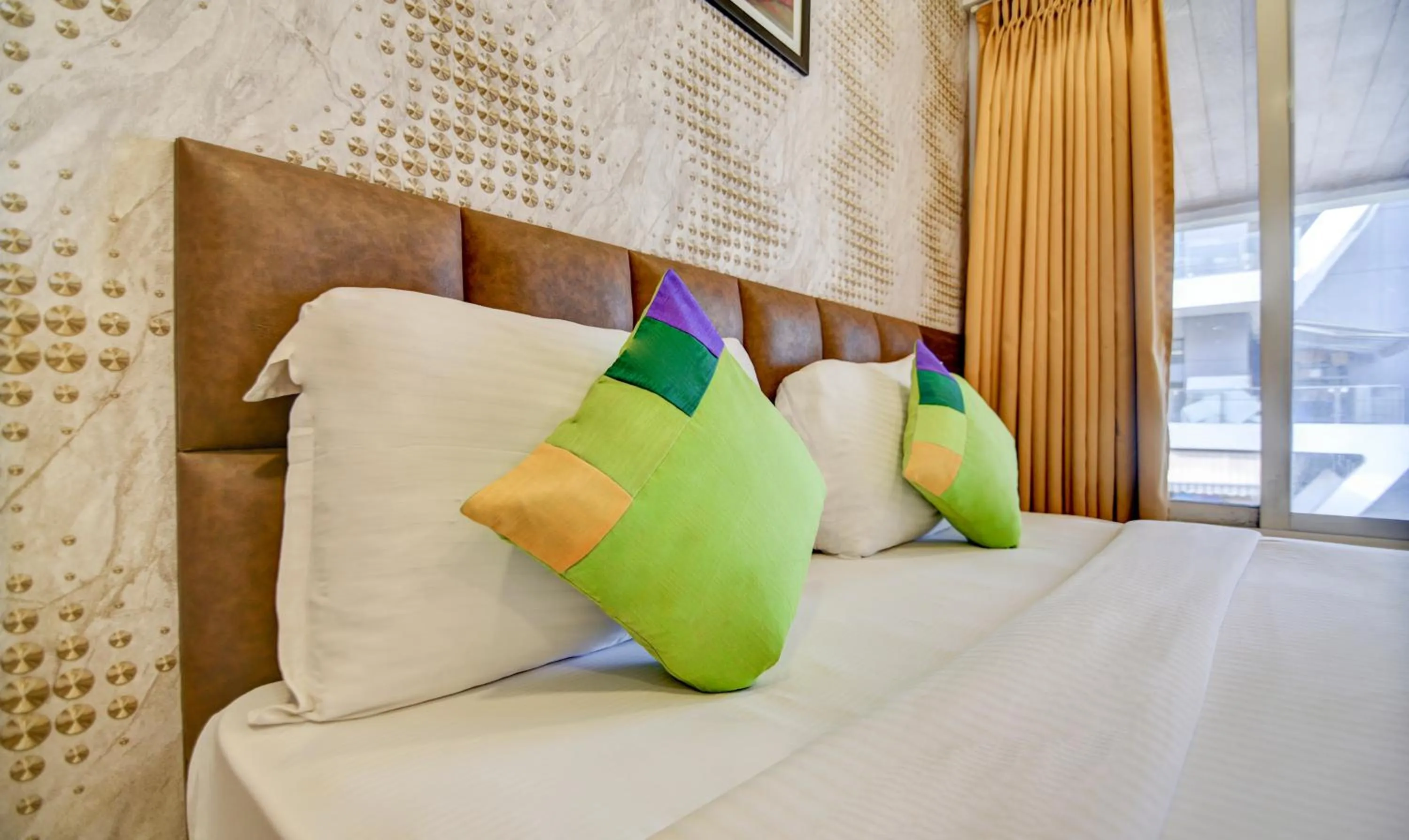 Bed in Treebo Kuval Inn