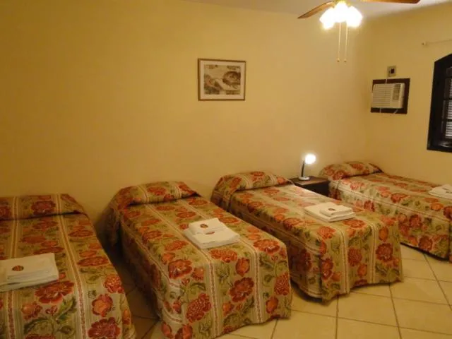 Bed in Pousada Martinez