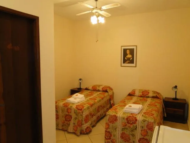 Bed in Pousada Martinez