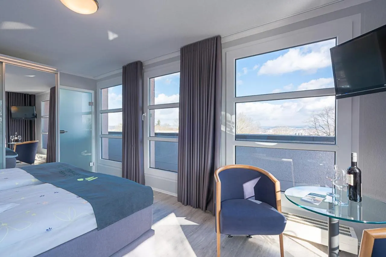 Photo of the whole room, Bed in BioHotel Kassel Wilhelmshöher Tor