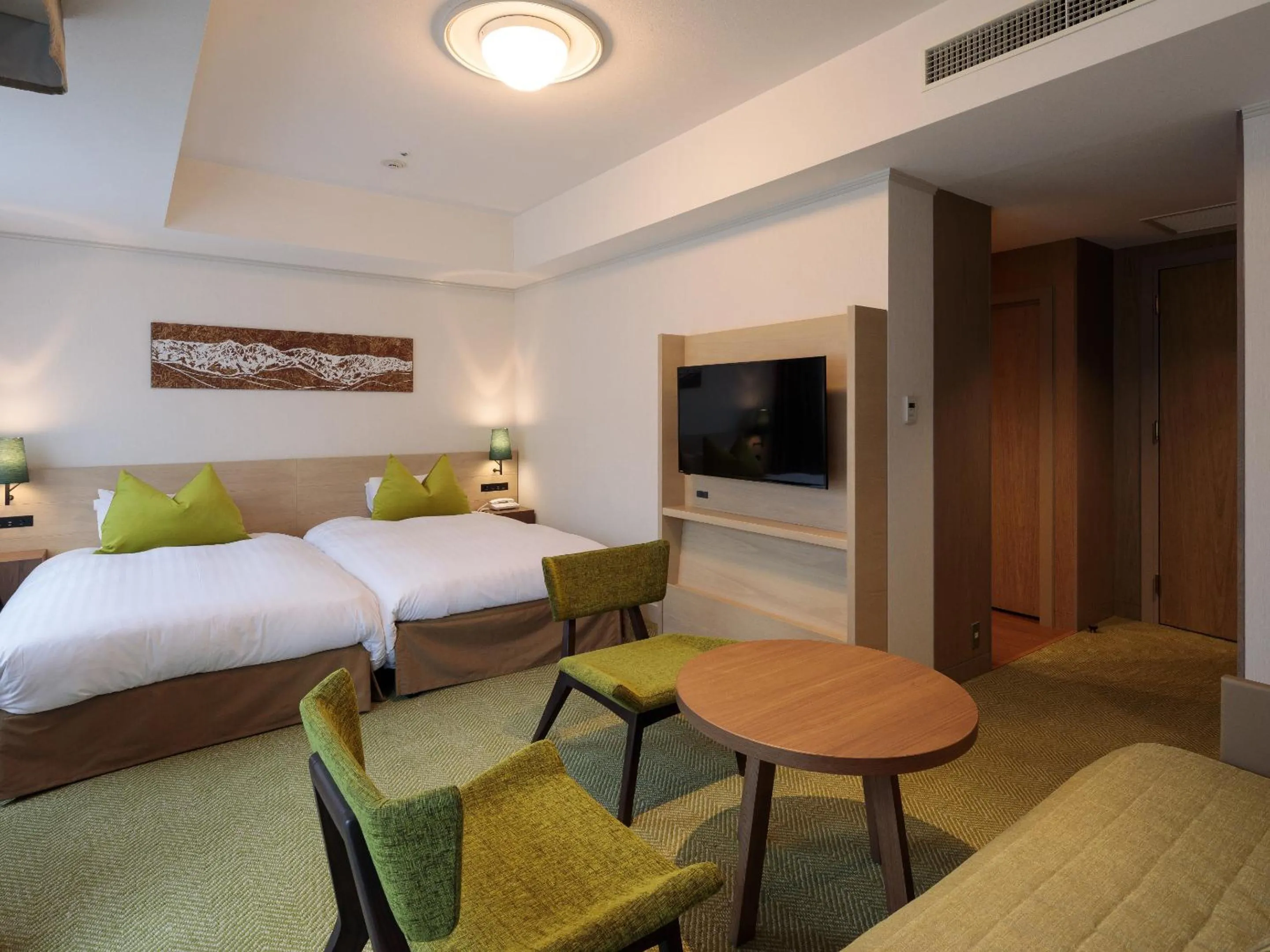 Bed in Hakuba Tokyu Hotel