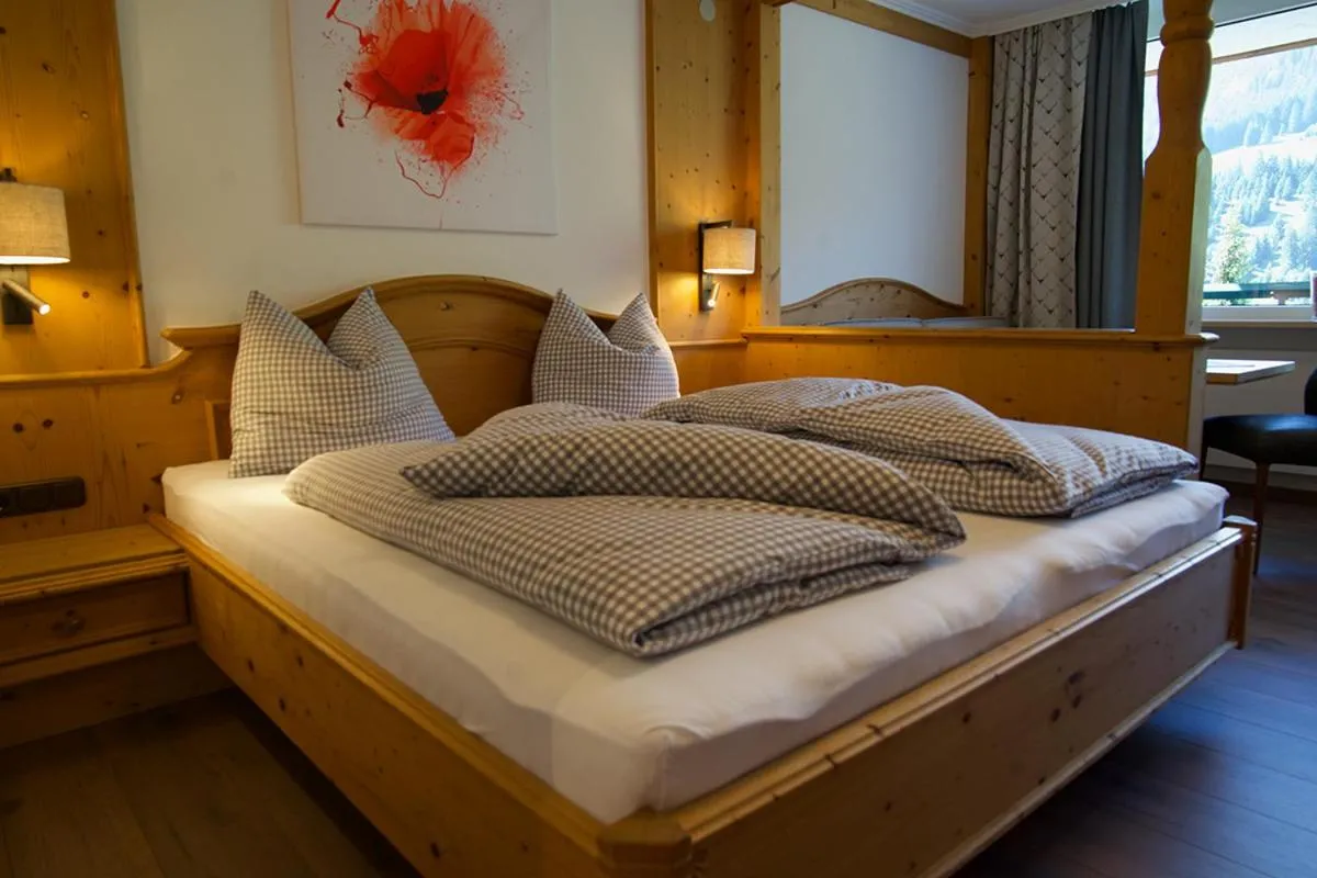 Bed in Garni Hotel Wildanger