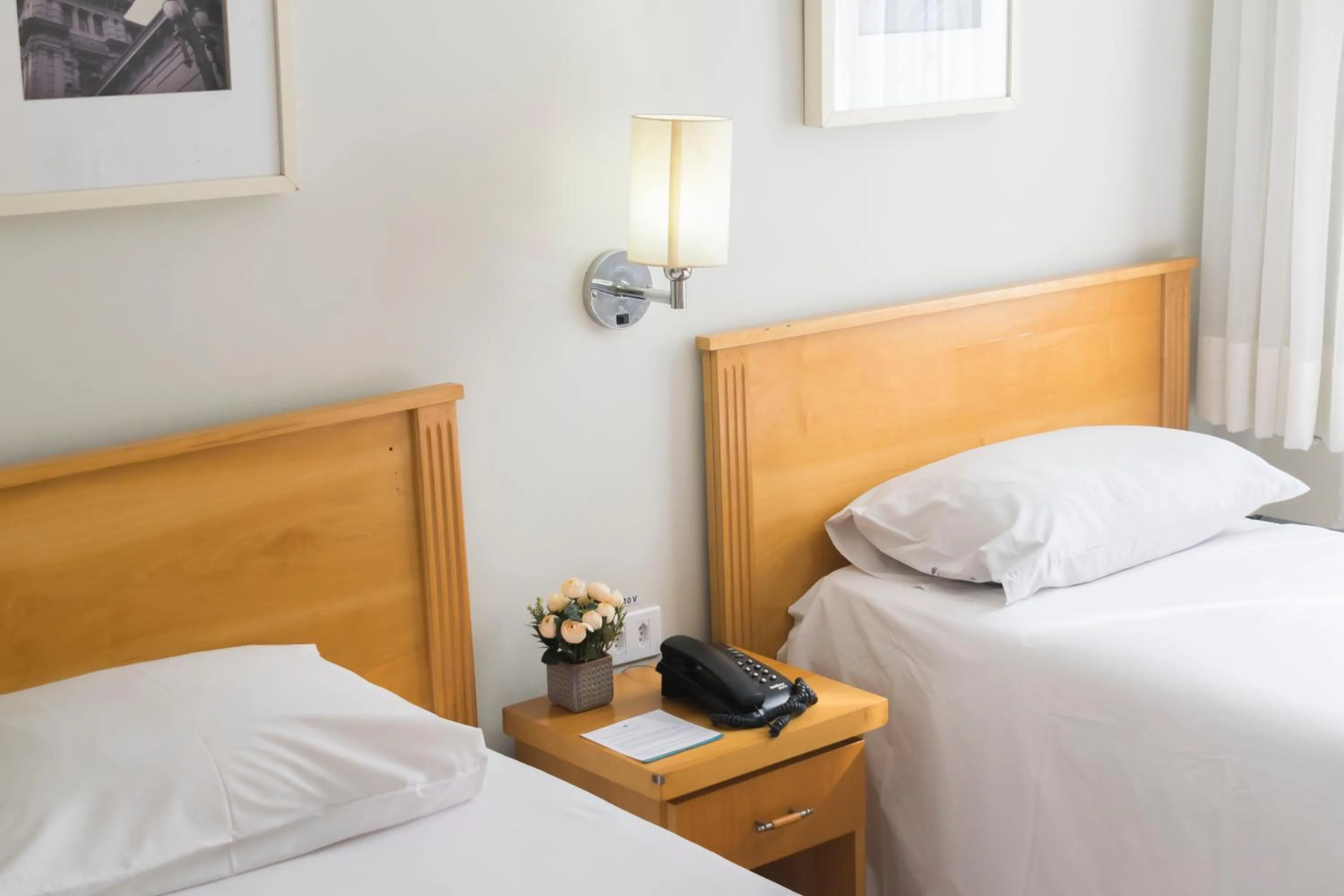 Bed in Paulista Garden Hotel