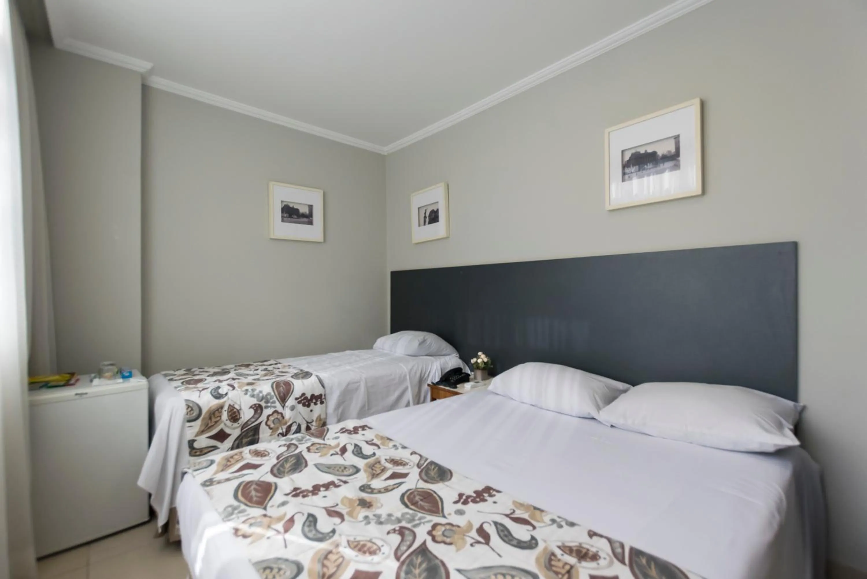 Bed in Paulista Garden Hotel