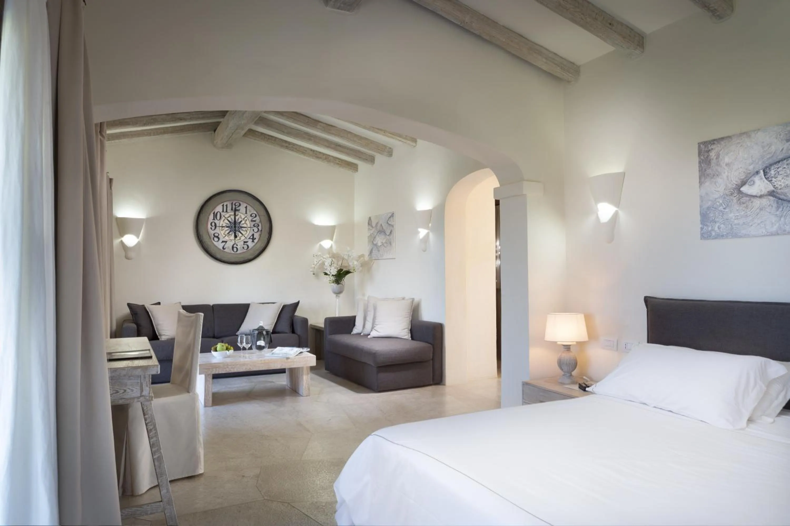 Seating area, Bed in Hotel Li Finistreddi