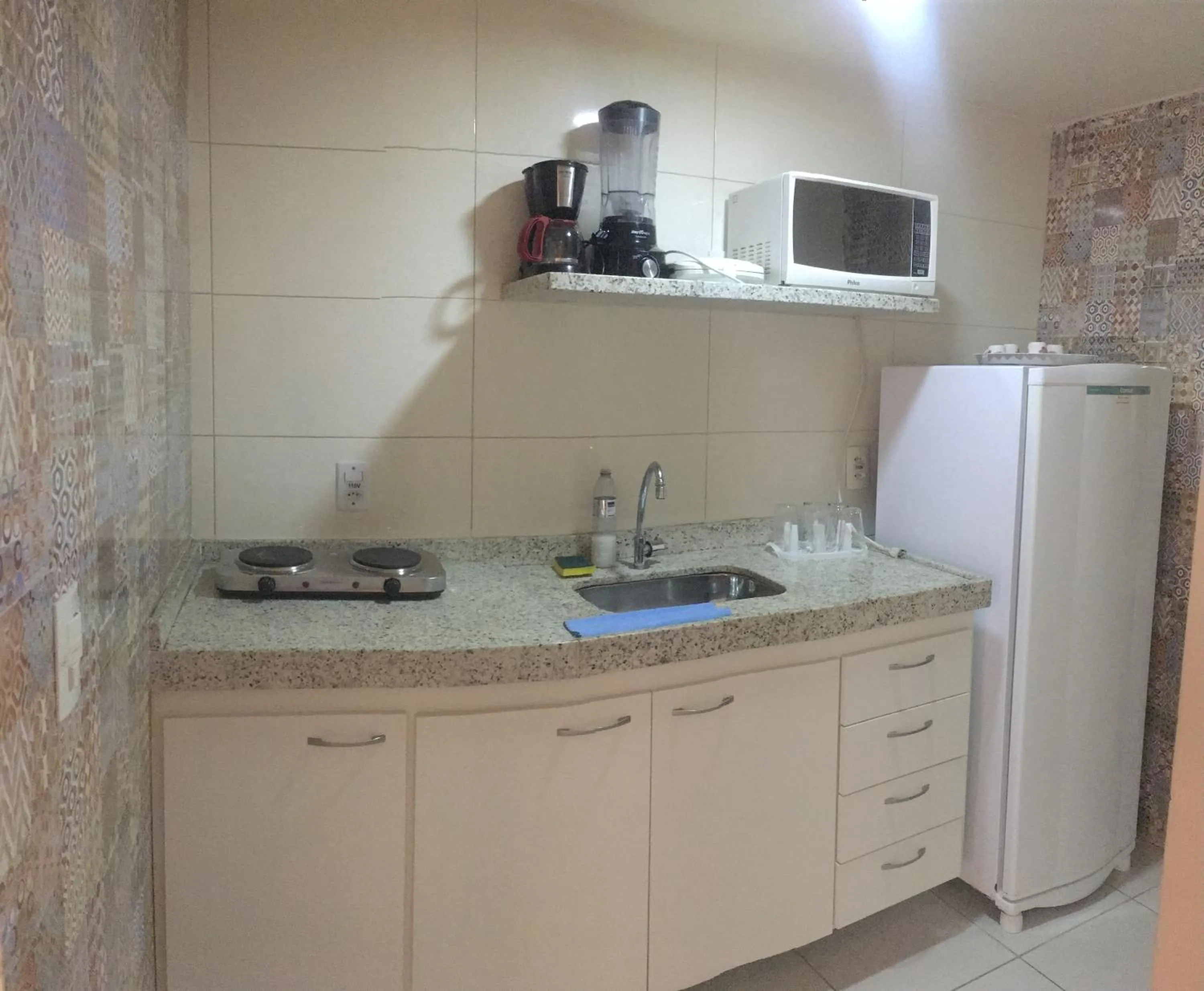 Kitchen or kitchenette in Apartamento no Centro Búzios